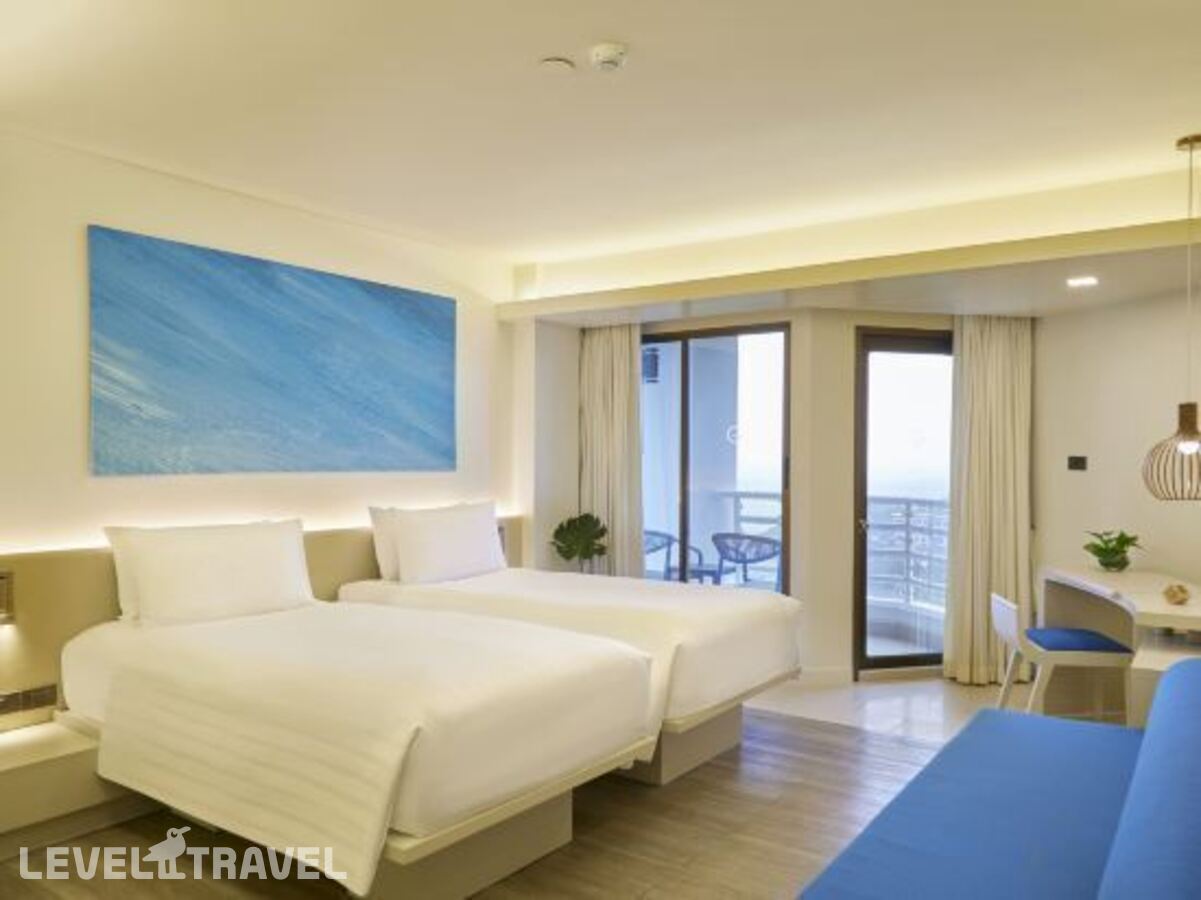 фотографии номера Премиум с видом на сад (две односпальные кровати) отеля Pullman Pattaya Hotel G в Таиланд(Вонгамат) - фото №1