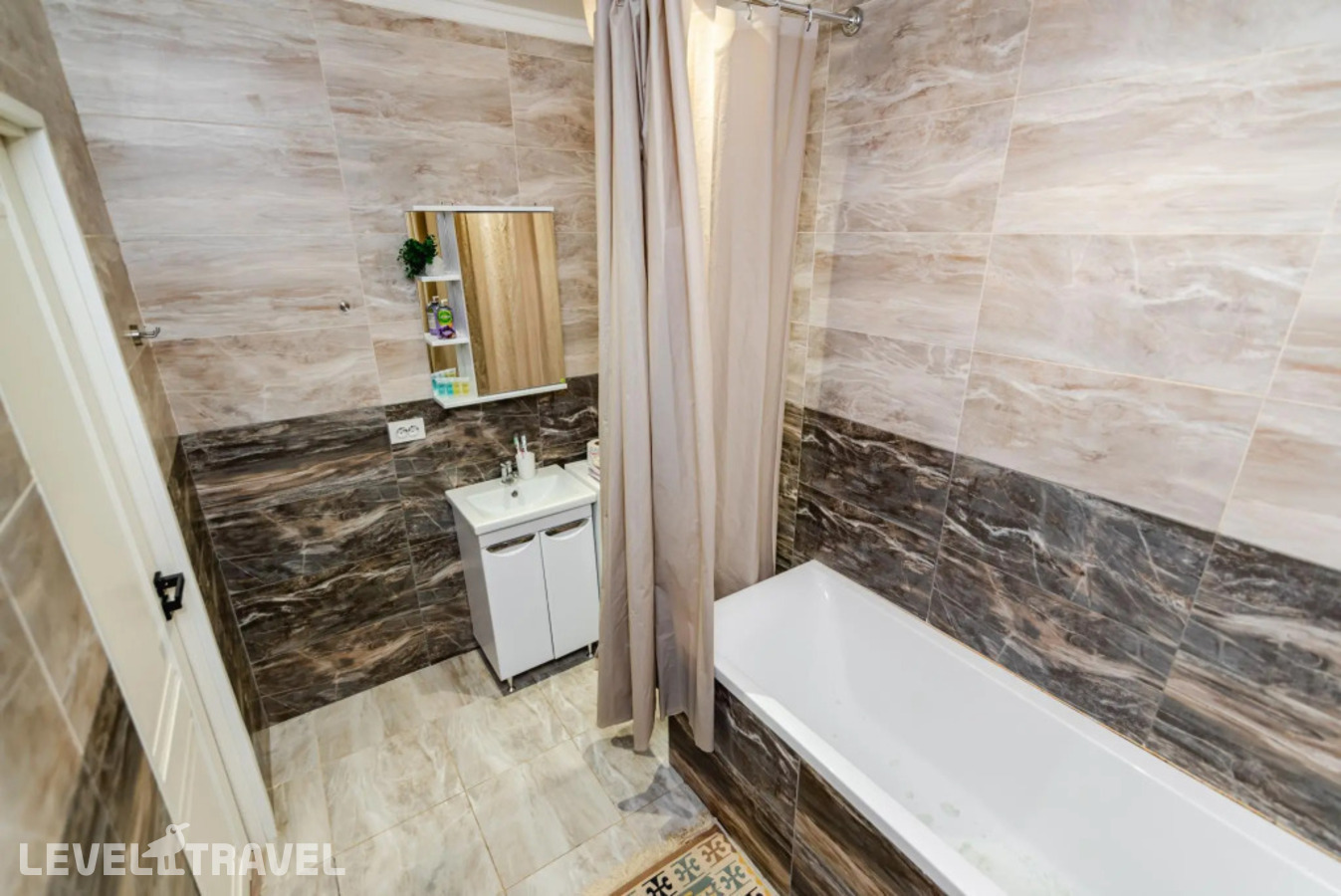 фотографии номера Трехместные апартаменты отеля Meridian Apartments На Улице Масанчи 23/11 в Казахстан(Алматы) - фото №9