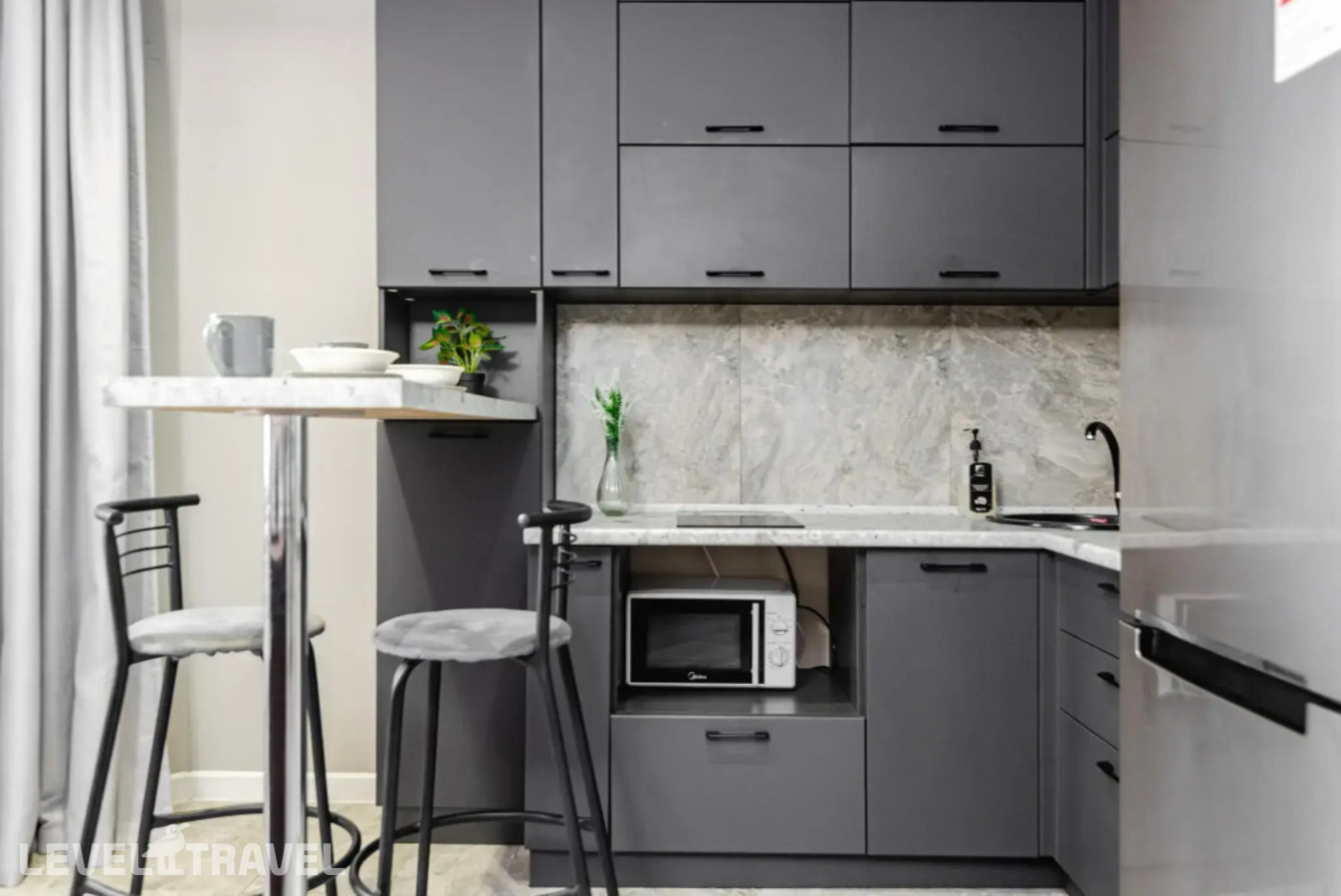 фотографии номера Трехместные апартаменты отеля Meridian Apartments На Улице Масанчи 23/11 в Казахстан(Алматы) - фото №1