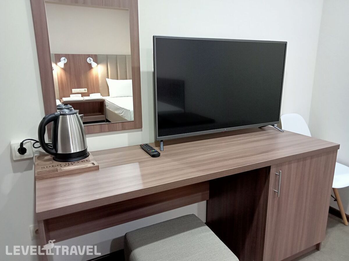 фотографии номера Стандартный с балконом (две односпальные кровати) отеля Solo Hotel в Россия(Лермонтово) - фото №3