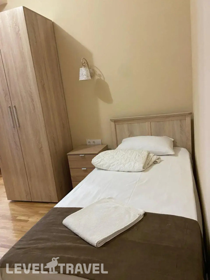 фотографии номера Четырёхместный семейный номер Comfort с балконом отеля Теплое Море в Россия(Сочи - Центр) - фото №3