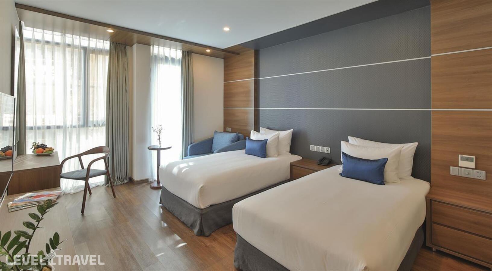 фотографии номера Номер Oasis с частичным видом на море отеля Haian Beach Hotel & Spa в Вьетнам(Дананг) - фото №3