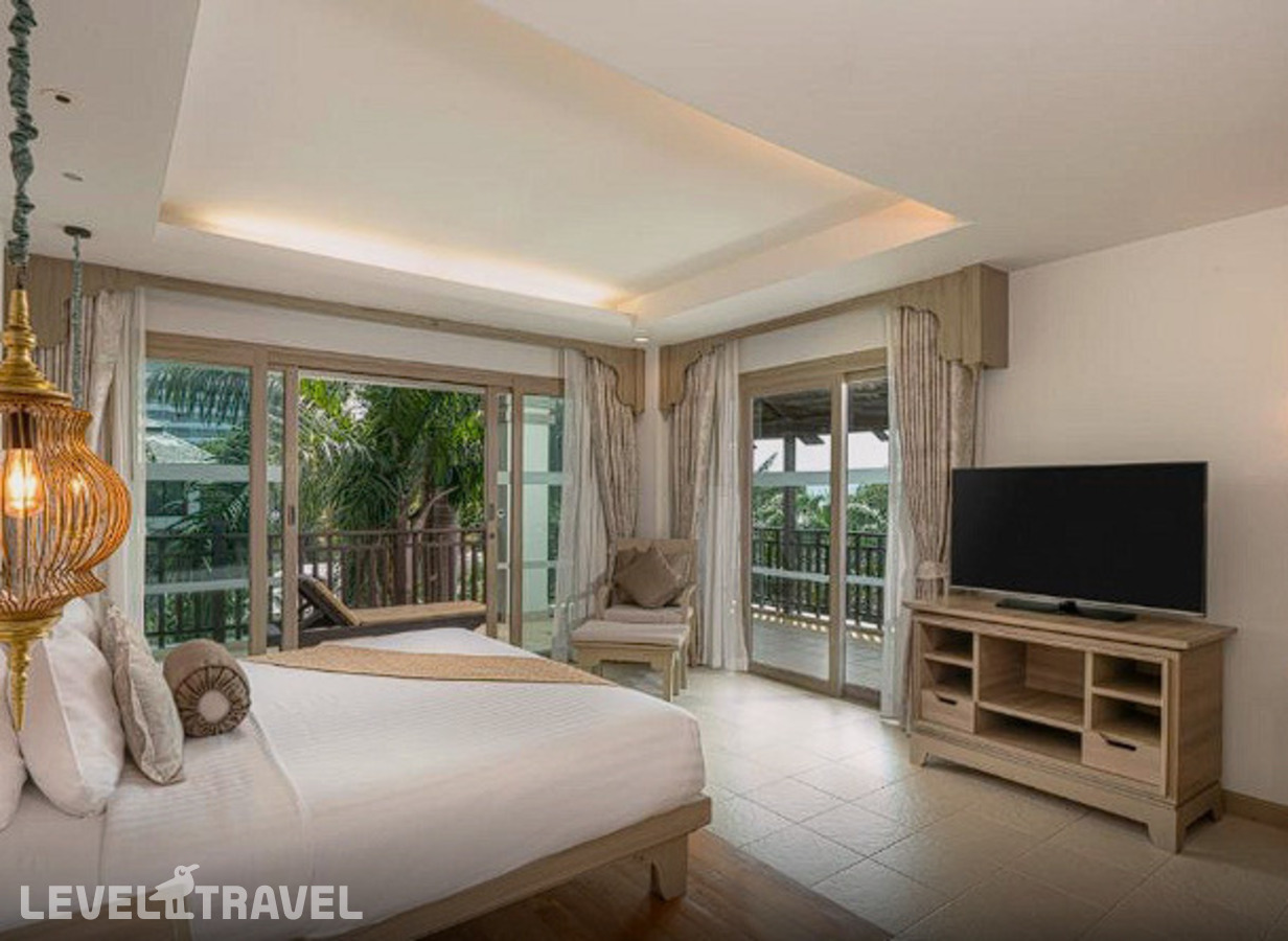 фотографии номера Семейный люкс с видом на сад (2 спальни) отеля Ravindra Beach Resort & Spa в Таиланд(Джомтьен) - фото №11