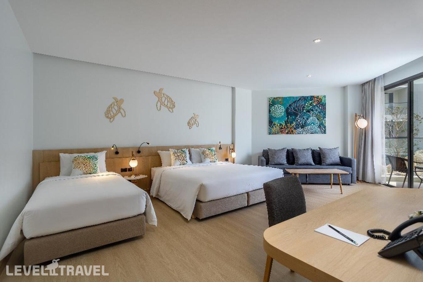фотографии номера Семейный с видом на сад отеля Phuket Emerald Beach Resort And Spa в Таиланд(Карон Бич) - фото №1