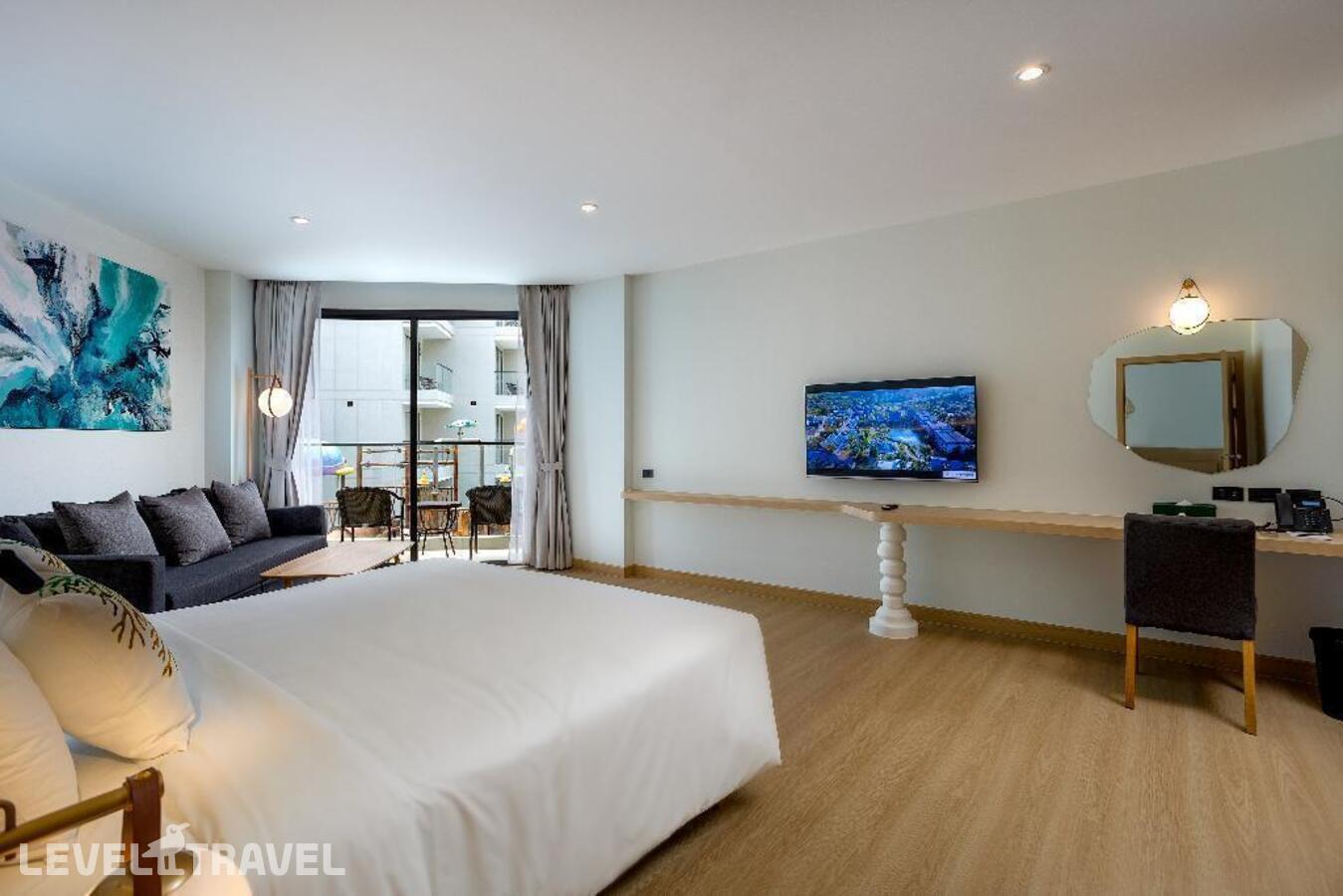 фотографии номера Семейный с видом на сад отеля Phuket Emerald Beach Resort And Spa в Таиланд(Карон Бич) - фото №2