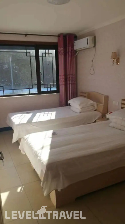 фотографии номера Стандартный (две односпальные кровати) отеля Beijing Ju Man Yuan Triditional Hotel в Китай(Пекин) - фото №1