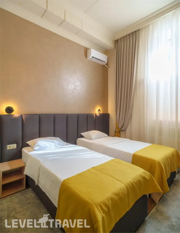 фотографии номера Двухместный номер Стандартный с красивым видом из окна двуспальная кровать отеля Отель Loft197 в Россия(Махачкала) - фото №13