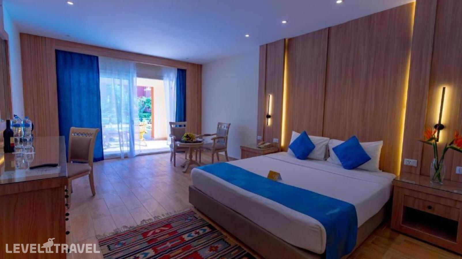 фотографии номера Полулюкс с выходом к бассейну отеля Caribbean World Resort Soma Bay в Египет(Сома Бей) - фото №1