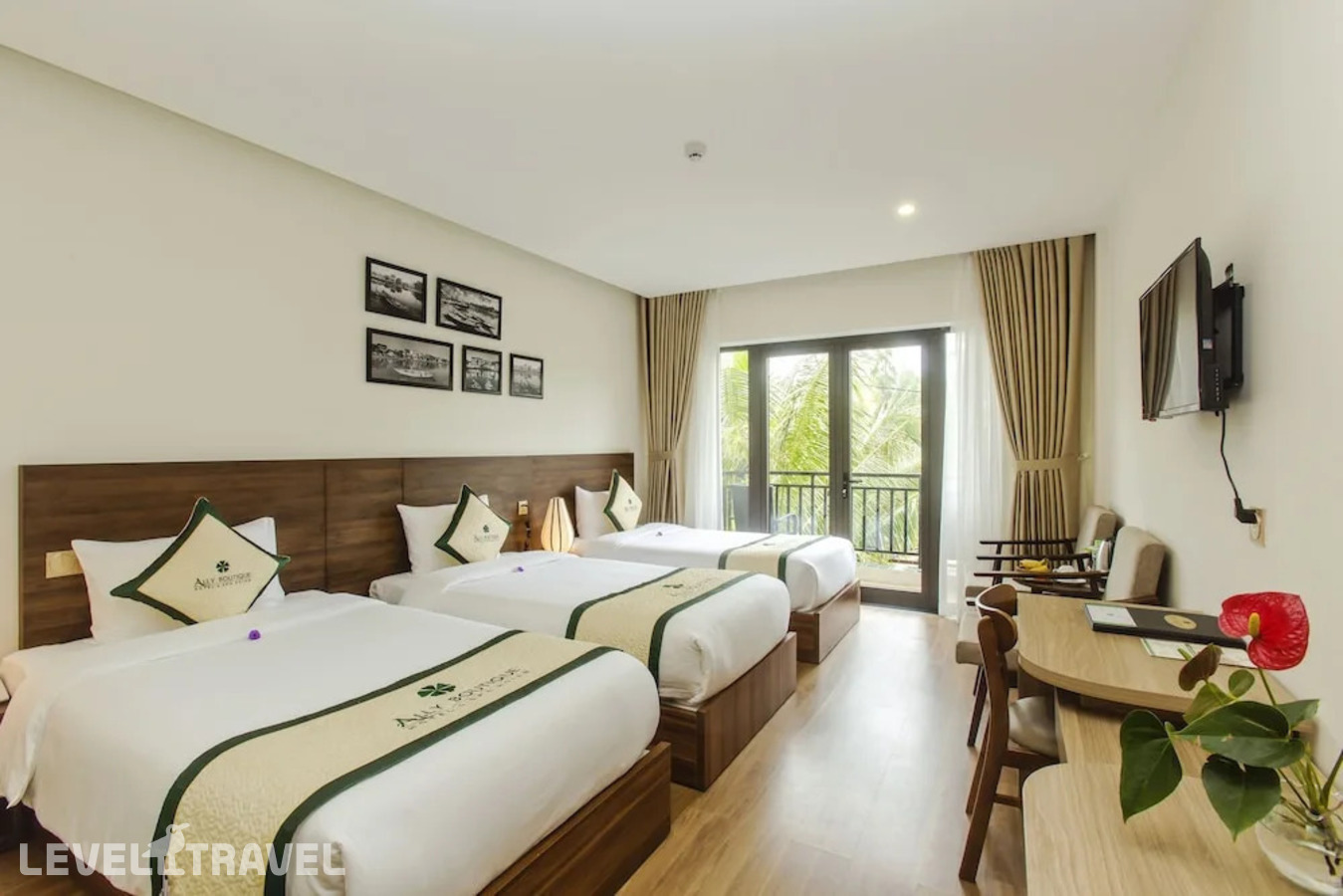 фотографии номера Трехместный делюкс отеля Ally Beach Boutique Hotel Hoian в Вьетнам(Хойан) - фото №3