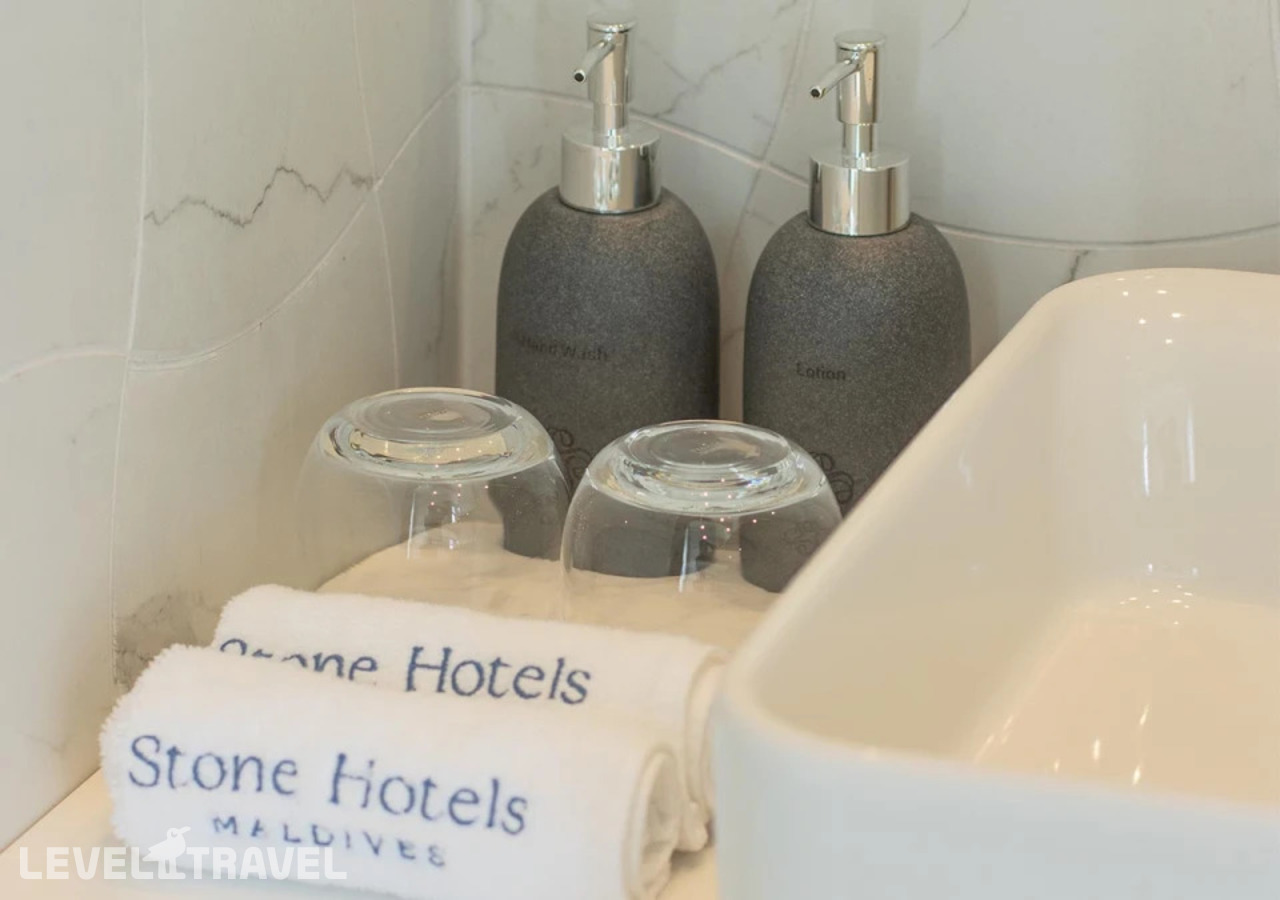 фотографии номера Делюкс с видом на море отеля Stone Hotels Maldives в Мальдивы(Диффуши) - фото №5
