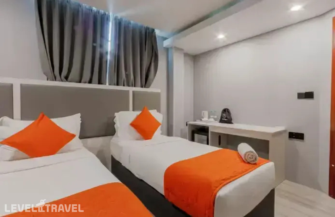 фотографии номера Улучшенный (две односпальные кровати) отеля Starry Beach Inn в Мальдивы(Хулхумале) - фото №4
