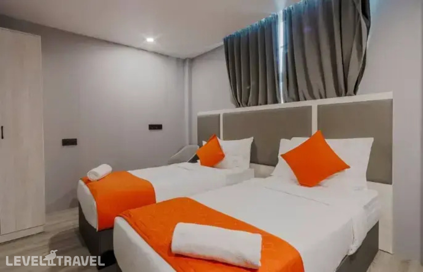 фотографии номера Улучшенный (две односпальные кровати) отеля Starry Beach Inn в Мальдивы(Хулхумале) - фото №1