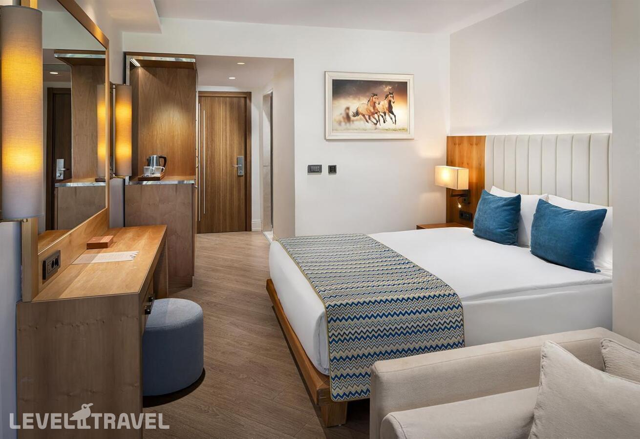 фотографии номера Стандартный с видом на сад отеля Liberty Hotels Lykia (Ex. Lykia World Oludeniz) в Турция(Олюдениз) - фото №2