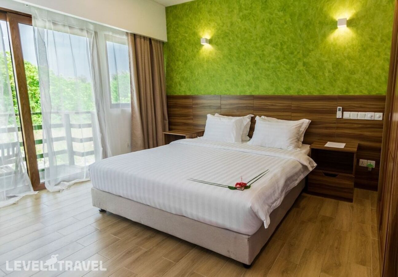 фотографии номера Делюкс на цокольном этаже (2 спальни) отеля Olive Goidhoo Guest House в Мальдивы(Баа Атолл) - фото №4