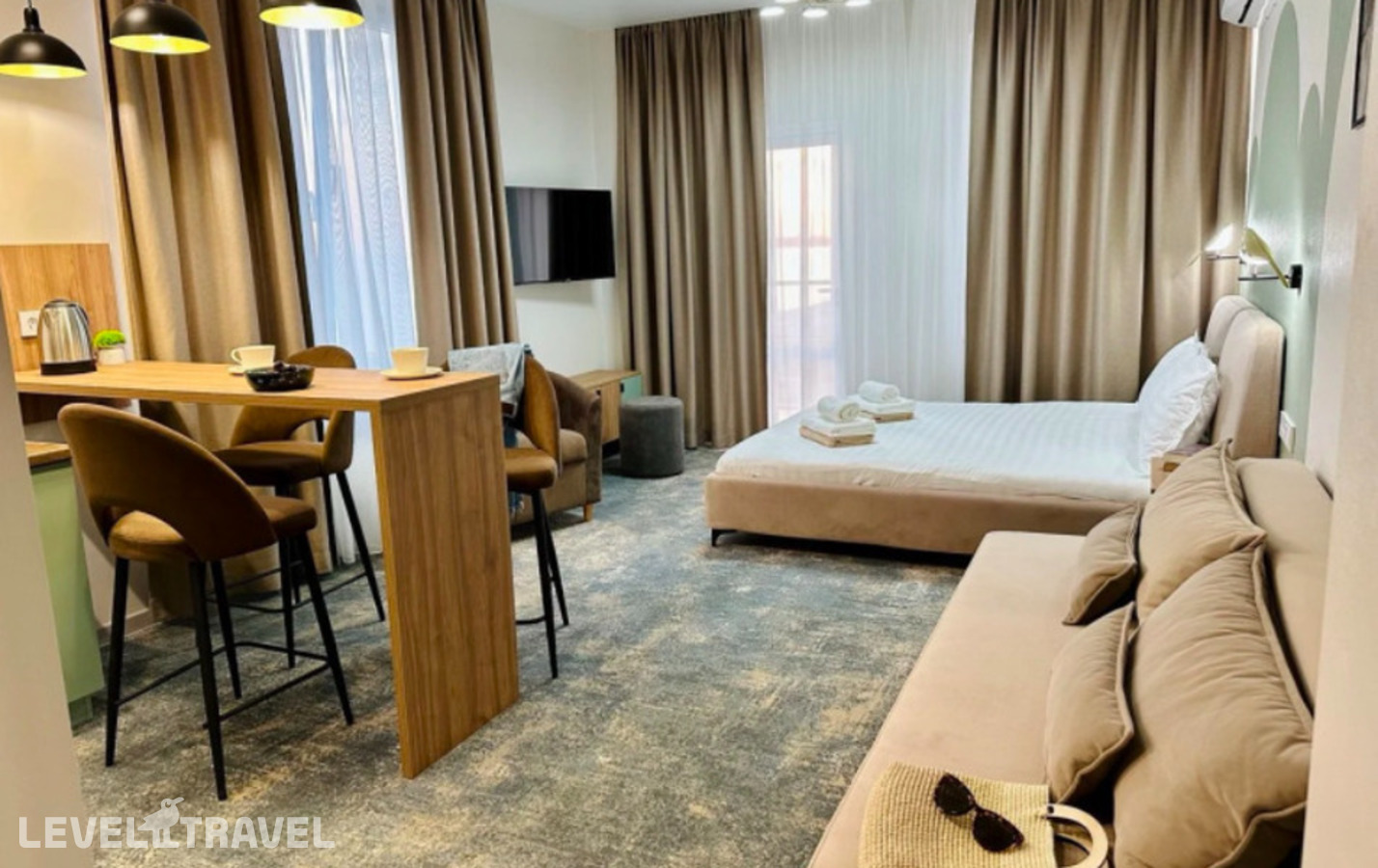 фотографии номера Cтандартные апартаменты с балконом отеля Таласса Hotel & Spa в Абхазия(Цандрыпш) - фото №1