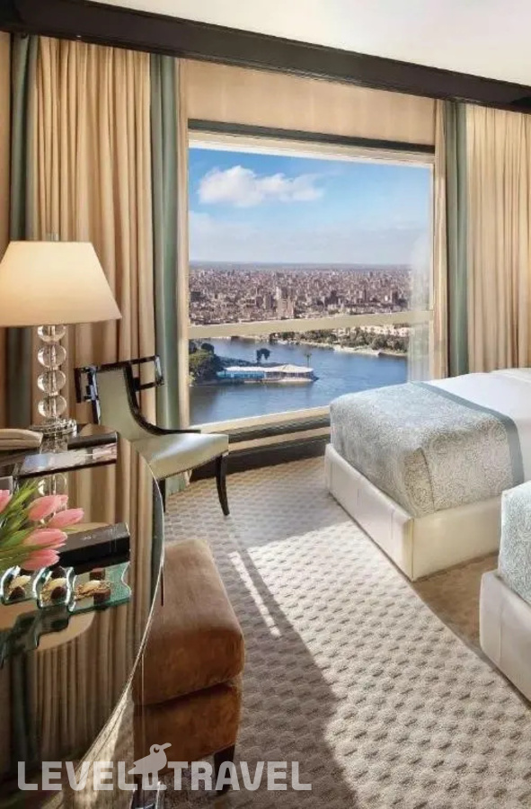 фотографии номера Номер Fairmont Gold с частичным видом на реку отеля Fairmont Nile City в Египет(Каир) - фото №2