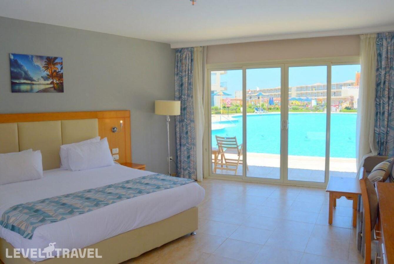 фотографии номера Бунгало с видом на бассейн отеля Rewaya Inn Resort (Ex. Hawaii Paradise Aqua Park Resort) в Египет(Хургада (город)) - фото №1