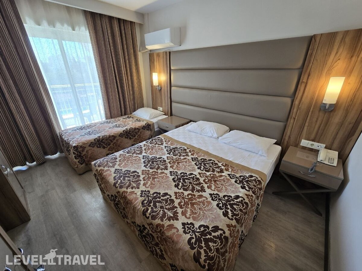 фотографии номера Стандартный номер отеля WB TRAVEL Serra Park в Турция(Титреенгель) - фото №1