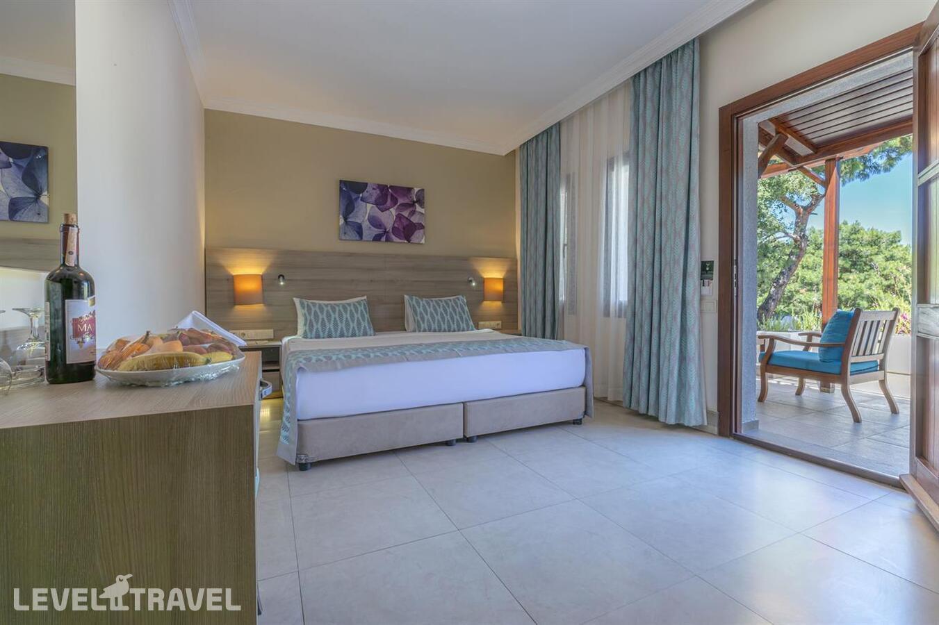 фотографии номера Клубный номер отеля Bodrum Park Resort в Турция(Ялычифтлик) - фото №1