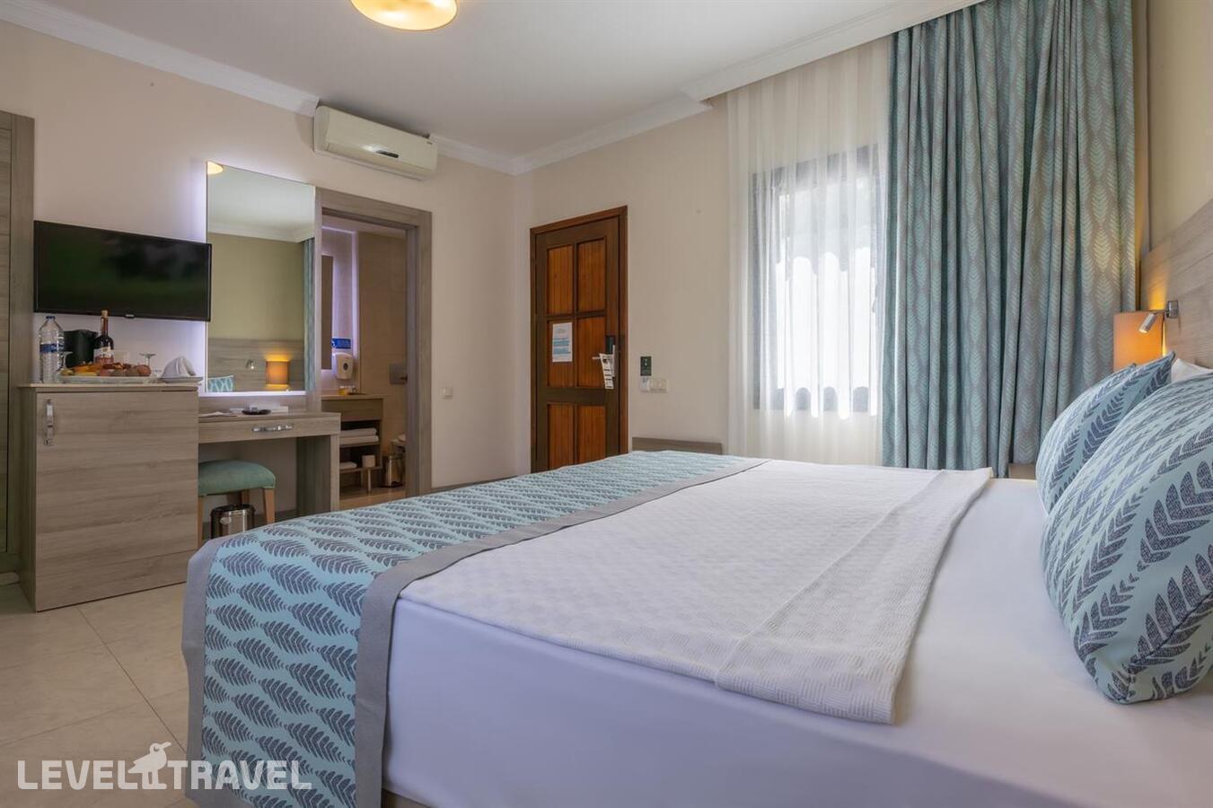 фотографии номера Клубный номер отеля Bodrum Park Resort в Турция(Ялычифтлик) - фото №2