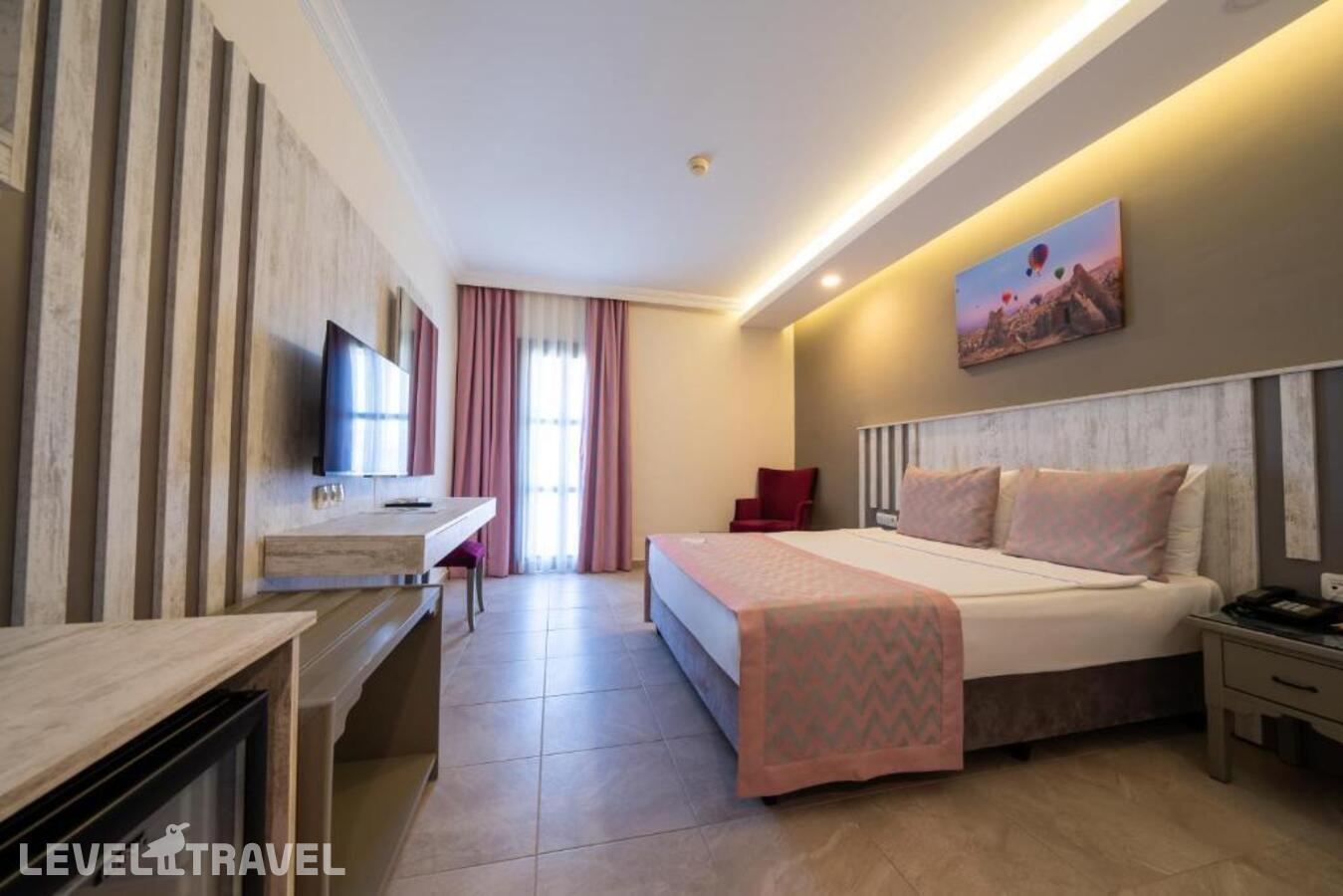 фотографии номера Семейный номер отеля Bodrum Park Resort в Турция(Ялычифтлик) - фото №1