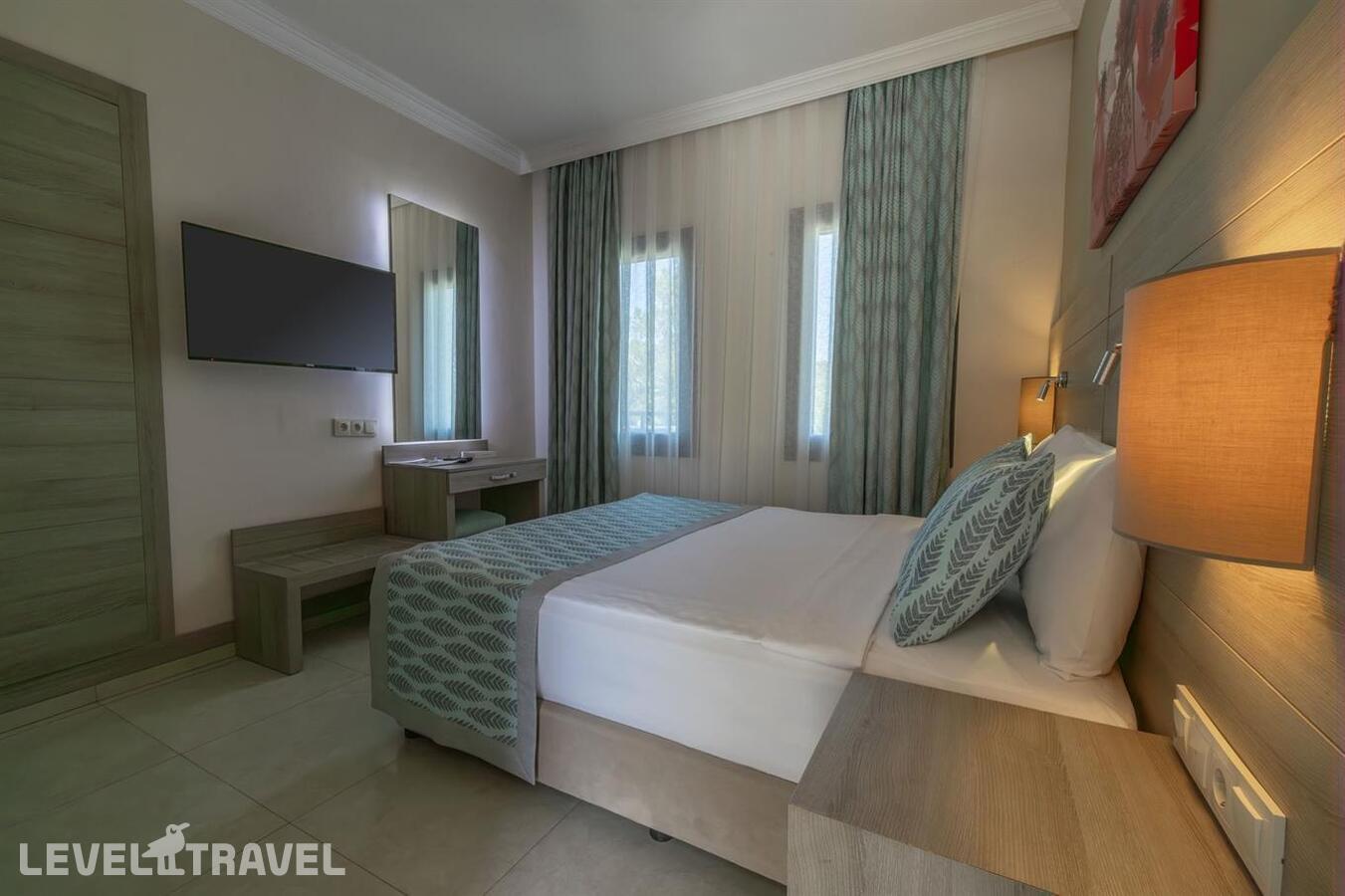 фотографии номера Клубный семейный полулюкс отеля Bodrum Park Resort в Турция(Ялычифтлик) - фото №3