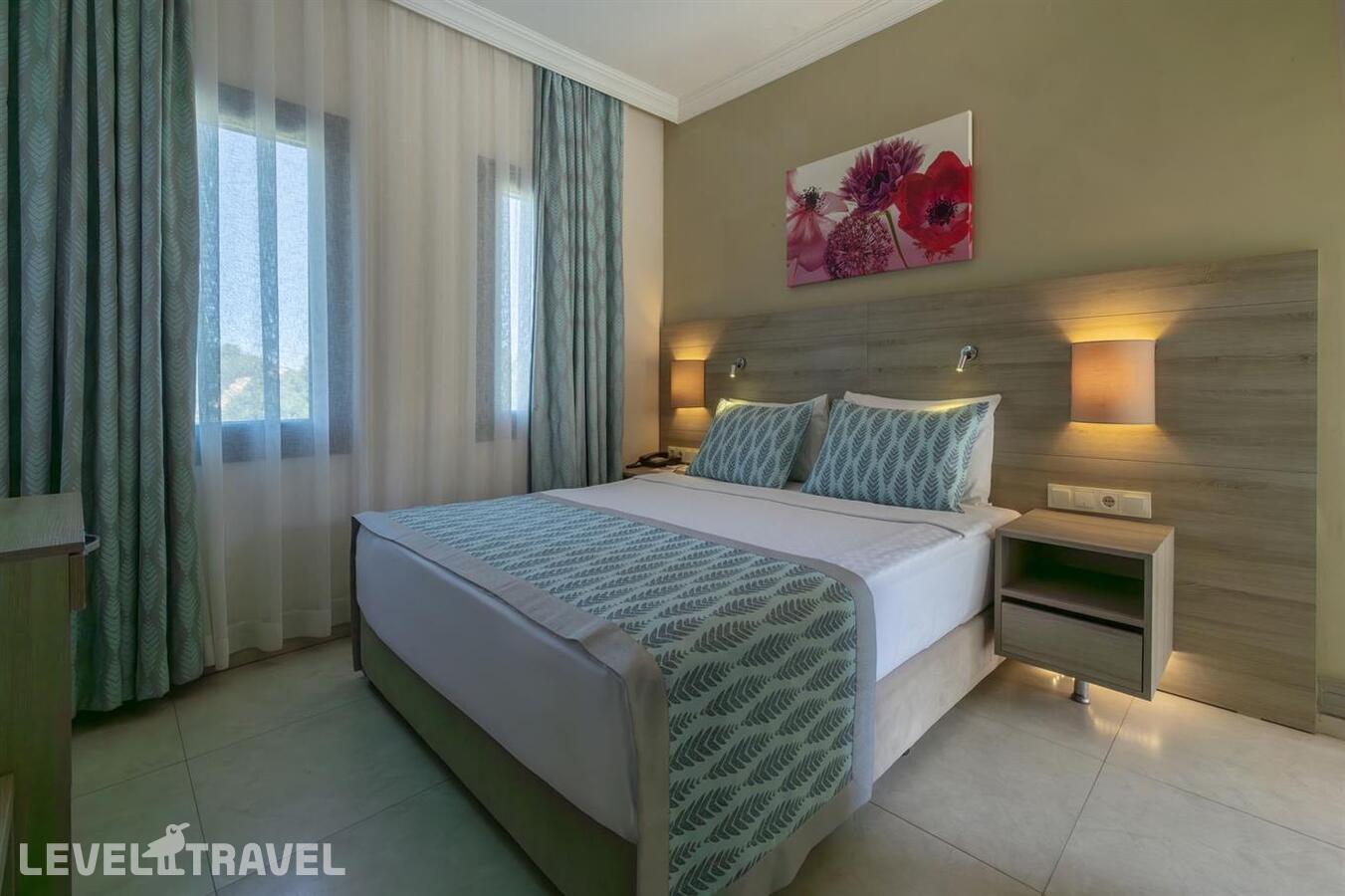 фотографии номера Клубный семейный полулюкс отеля Bodrum Park Resort в Турция(Ялычифтлик) - фото №2