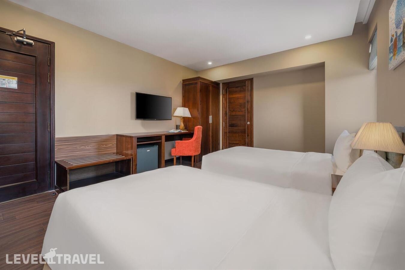 фотографии номера Делюкс отеля Yarra Ocean Suites Da Nang Hotel в Вьетнам(Дананг) - фото №1