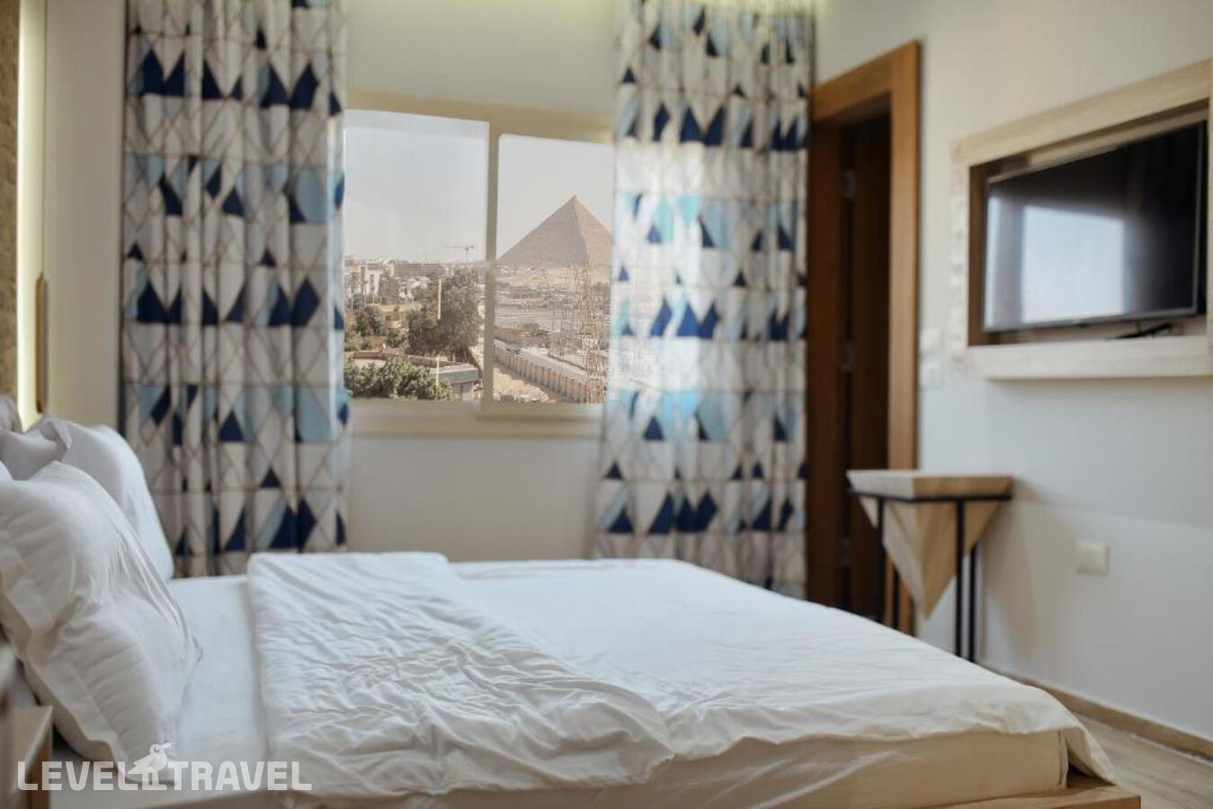 фотографии номера Делюкс отеля Royal Great Pyramid Inn в Египет(Гиза) - фото №2