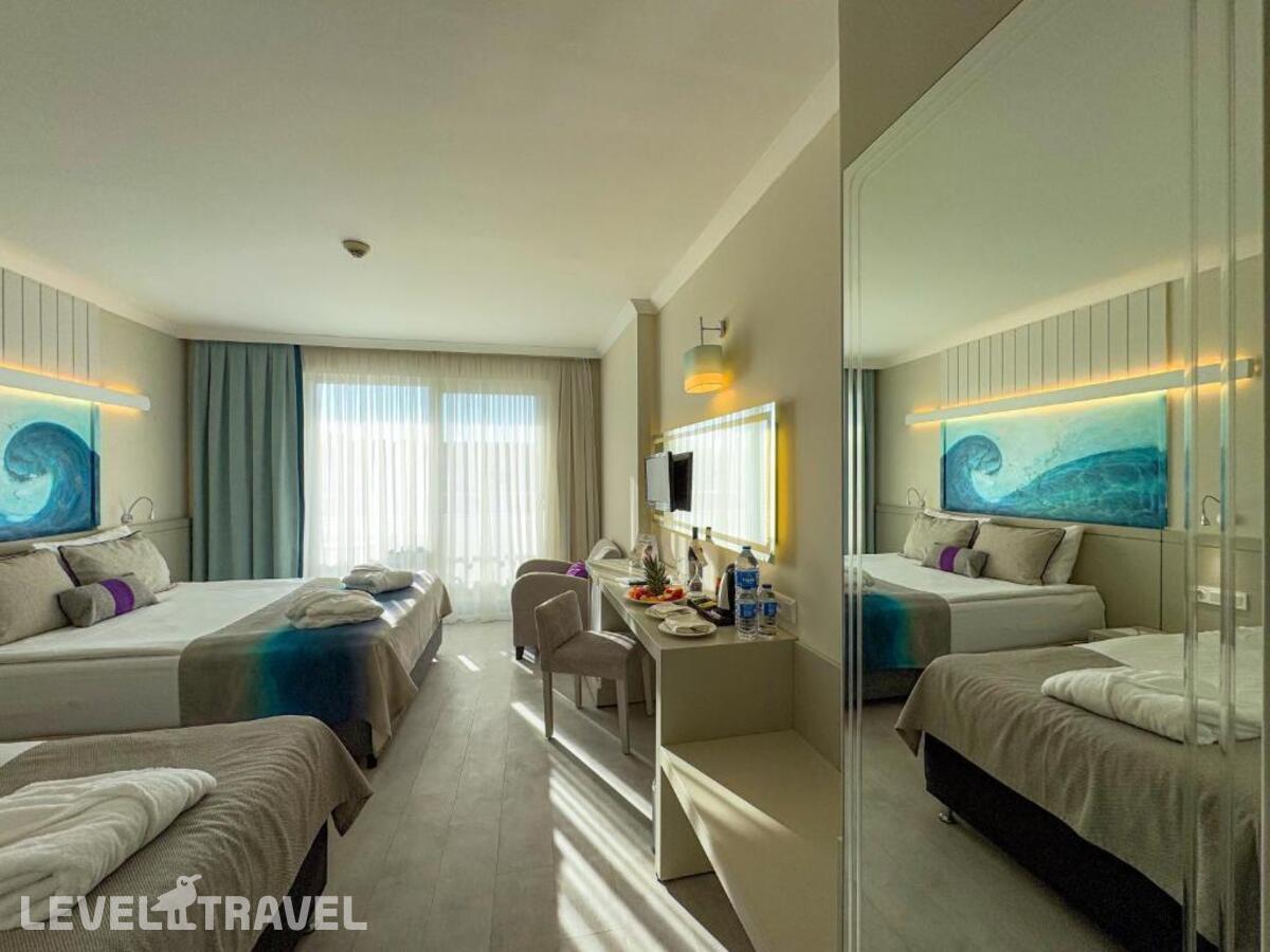 фотографии номера Стандартный номер отеля Catamaran Quality Times (Ex. Catamaran Resort Hotel) в Турция(Бельдиби) - фото №1
