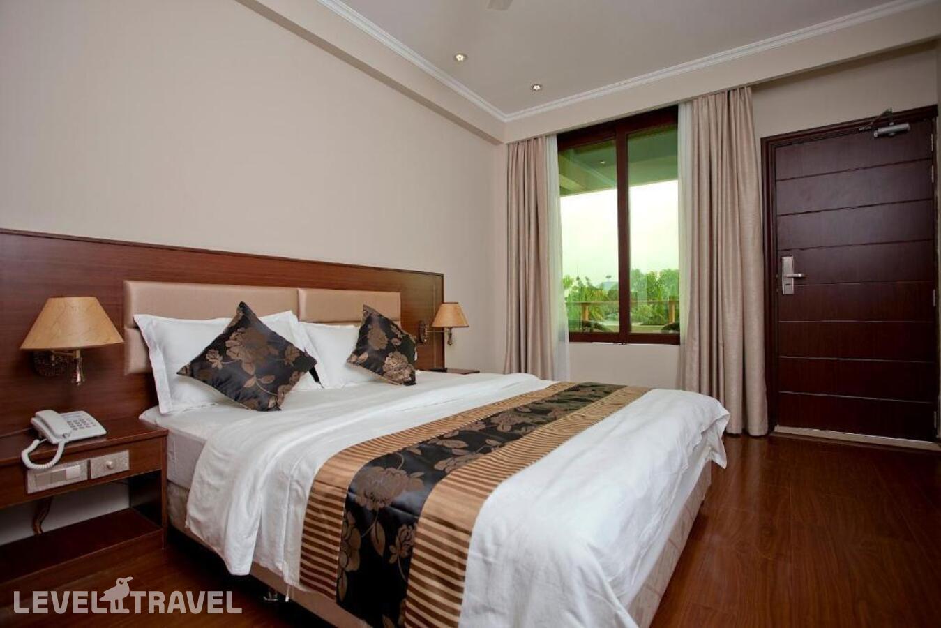 фотографии номера Делюкс с балконом отеля Kaani Haven Beach в Мальдивы(Укулас) - фото №1