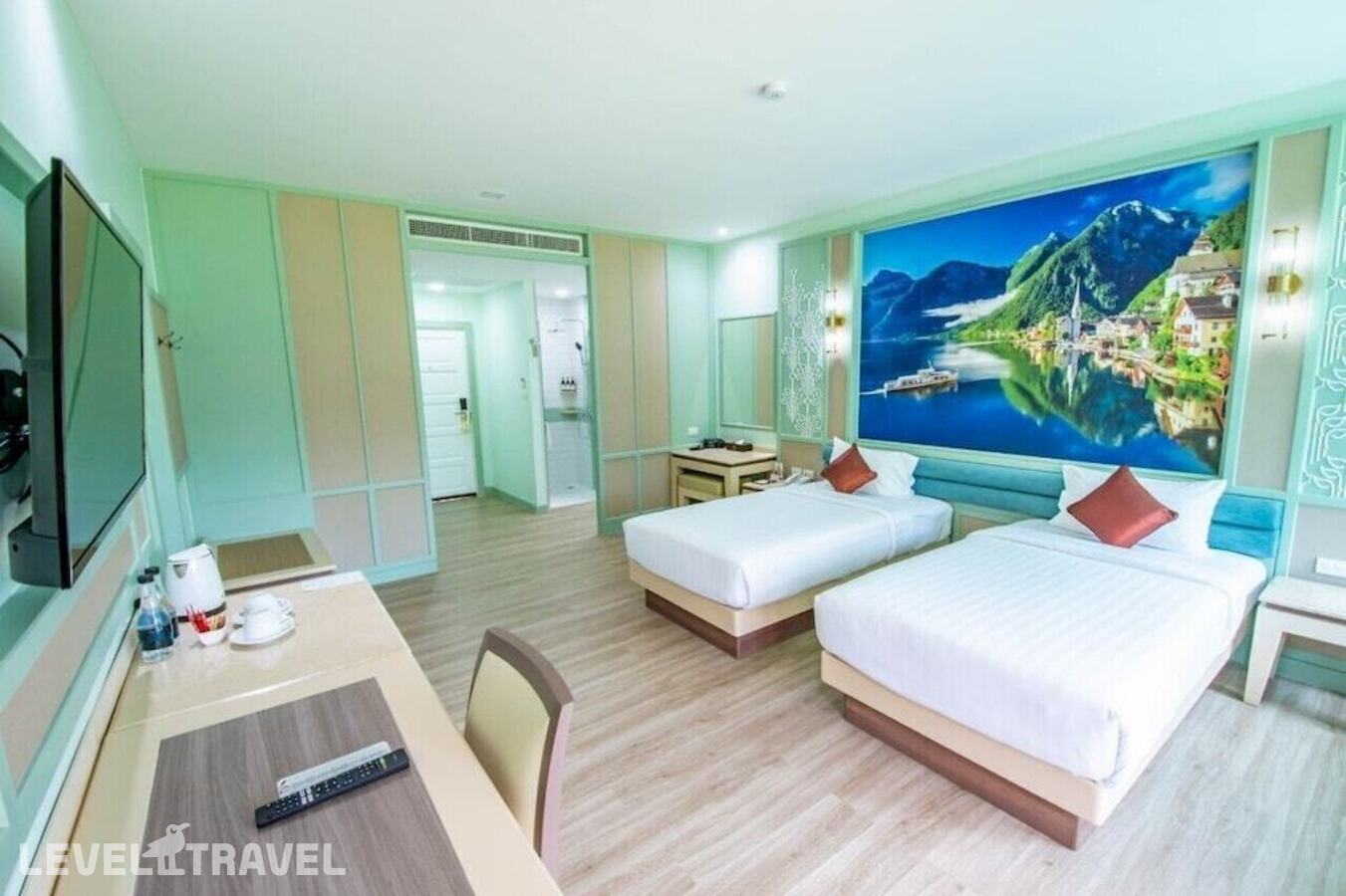 фотографии номера Делюкс с видом на сад (две односпальные кровати) отеля Duangjitt Resort в Таиланд(Патонг Бич) - фото №2