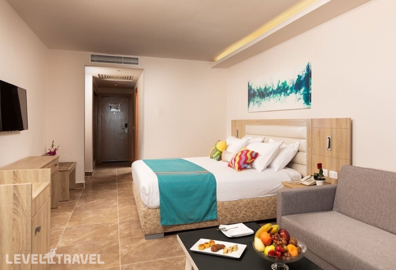 фотографии номера Трехместный делюкс отеля Pickalbatros Palace Resort Sharm El Sheikh в Египет(Рас-Насрани) - фото №1