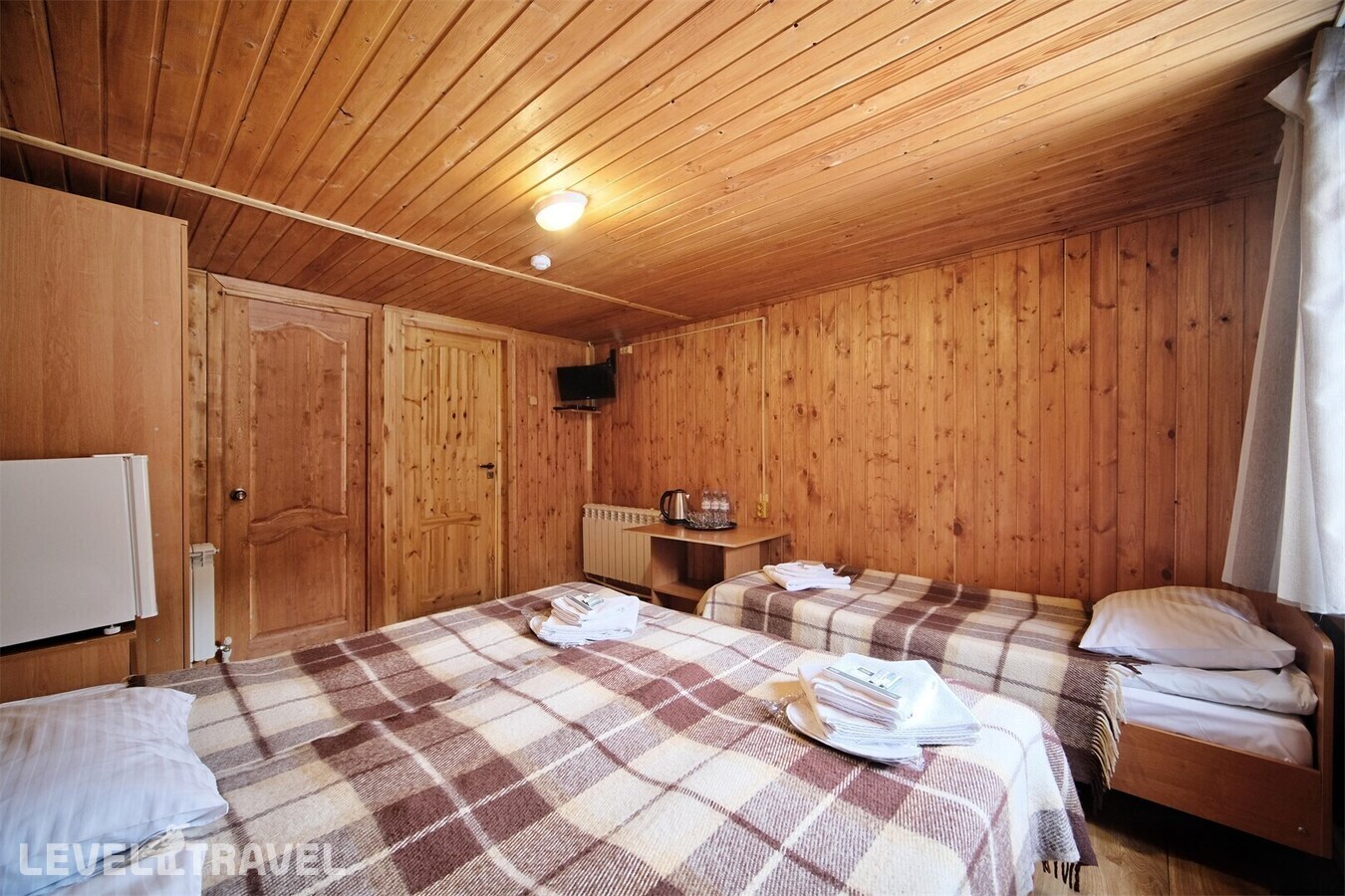 фотографии номера Трехместный домик отеля Allure Lodge в Россия(Архыз) - фото №3