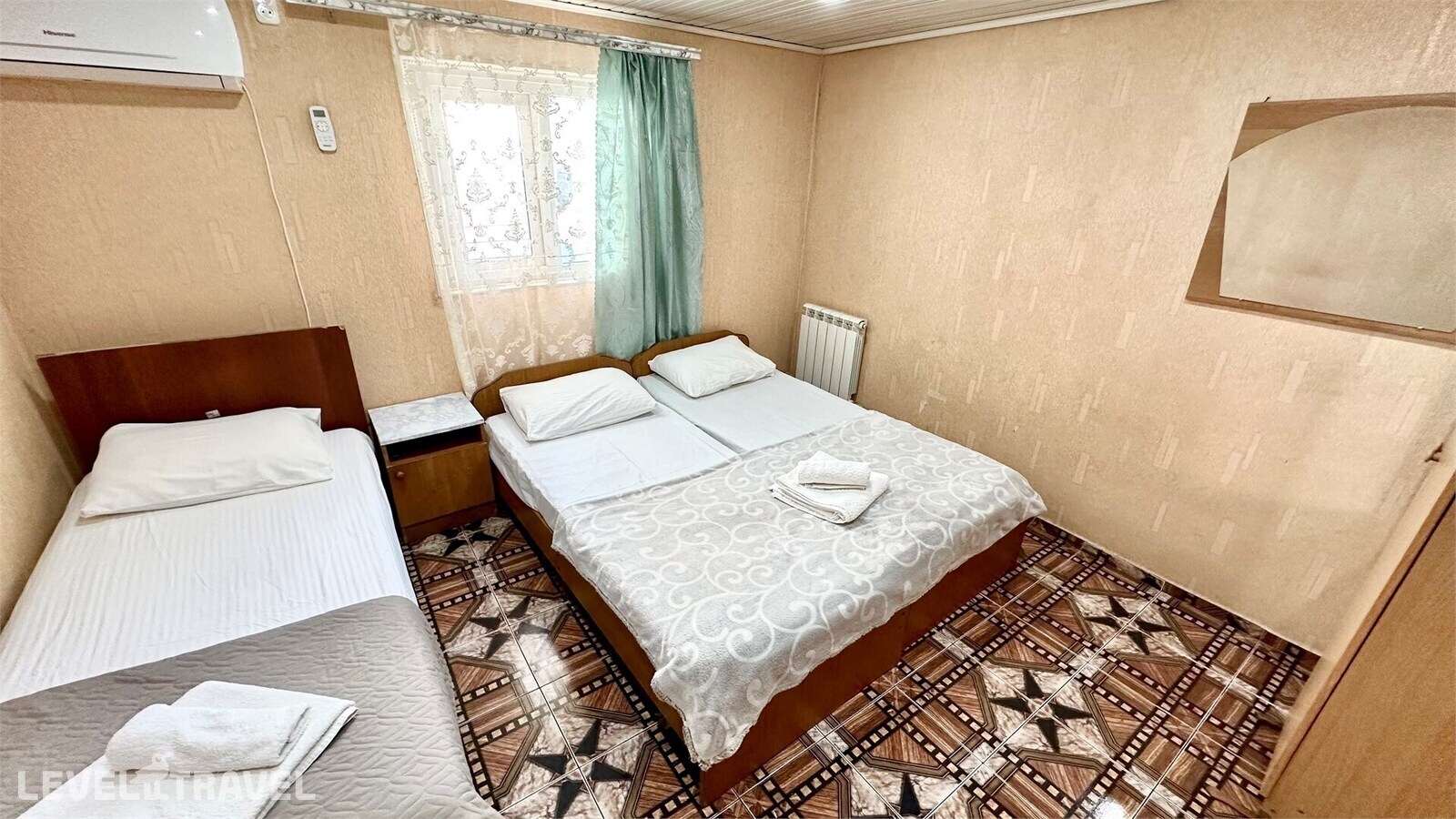 фотографии номера Трёхместный бюджетный (корпус 2) отеля Отель Мартлен в Россия(Адлер) - фото №5