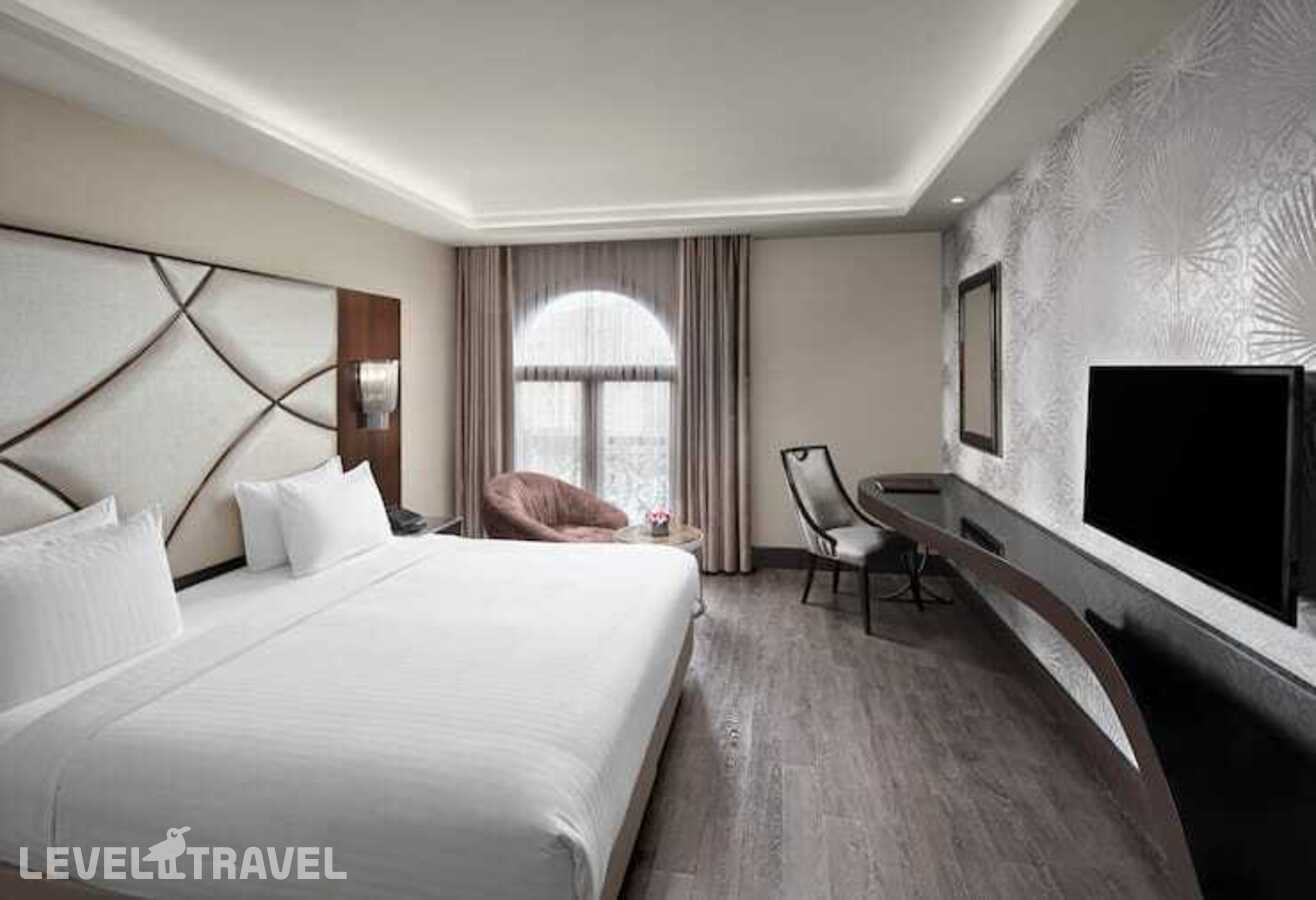фотографии номера Стандартный с видом на город отеля Doubletree By Hilton Istanbul Esentepe (Ex. Biz Cevahir Hotel) в Турция(Шишли) - фото №1