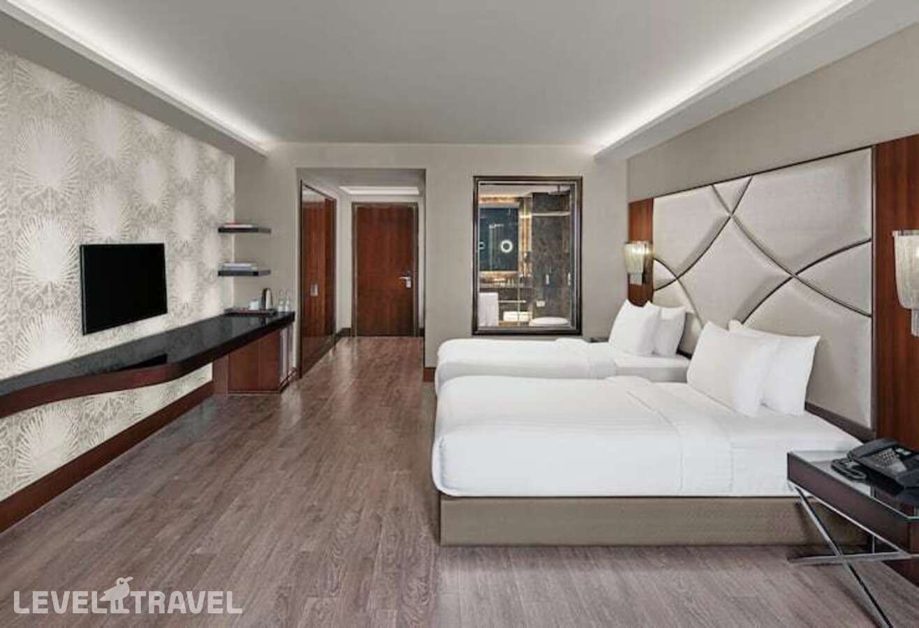 фотографии номера Делюкс с видом на город (две односпальные кровати) отеля Doubletree By Hilton Istanbul Esentepe (Ex. Biz Cevahir Hotel) в Турция(Шишли) - фото №2