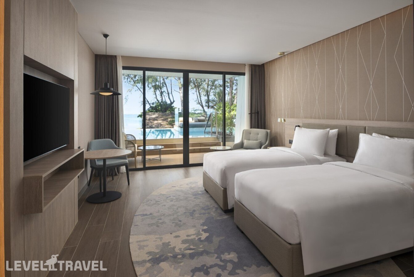 фотографии номера Премиум с доступом в бассейн отеля Radisson Blu Resort Phuket Mai Khao Beach в Таиланд(Май Као Бич) - фото №1