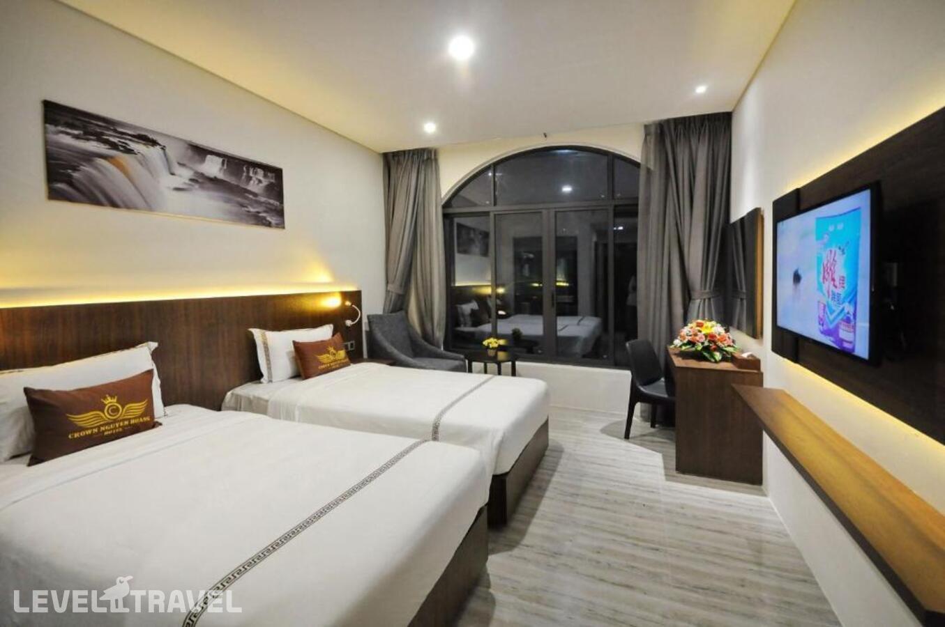 фотографии номера Улучшенный (две односпальные кровати) отеля Crown Nguyen Hoang Hotel в Вьетнам(Нячанг) - фото №1