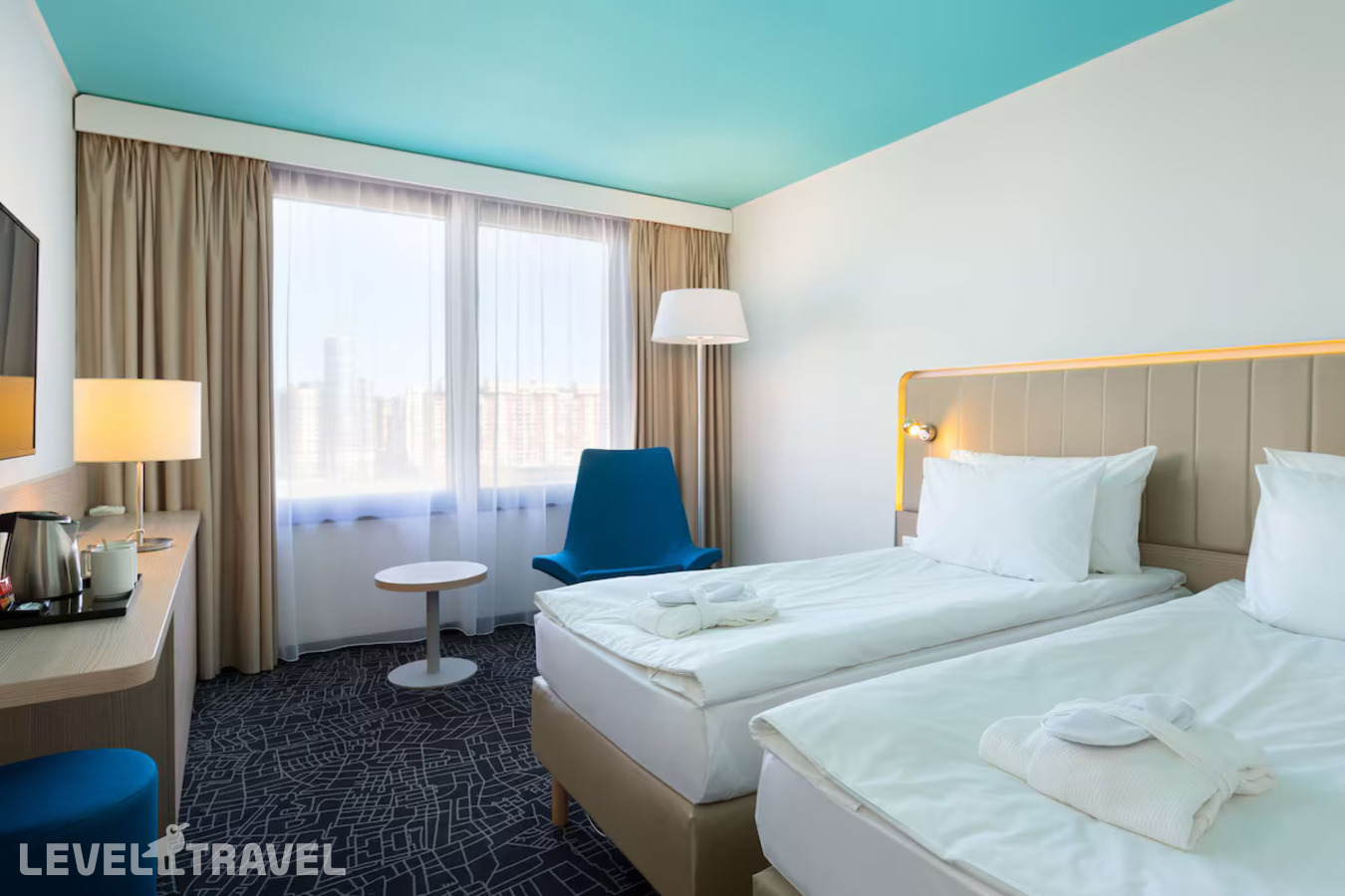 фотографии номера Улучшенный номер отеля Cosmos Saint-Petersburg Pribaltiyskaya Hotel (Ex. Park Inn By Radisson Pribaltiyskaya Hotel) в Россия(Василеостровский район) - фото №8