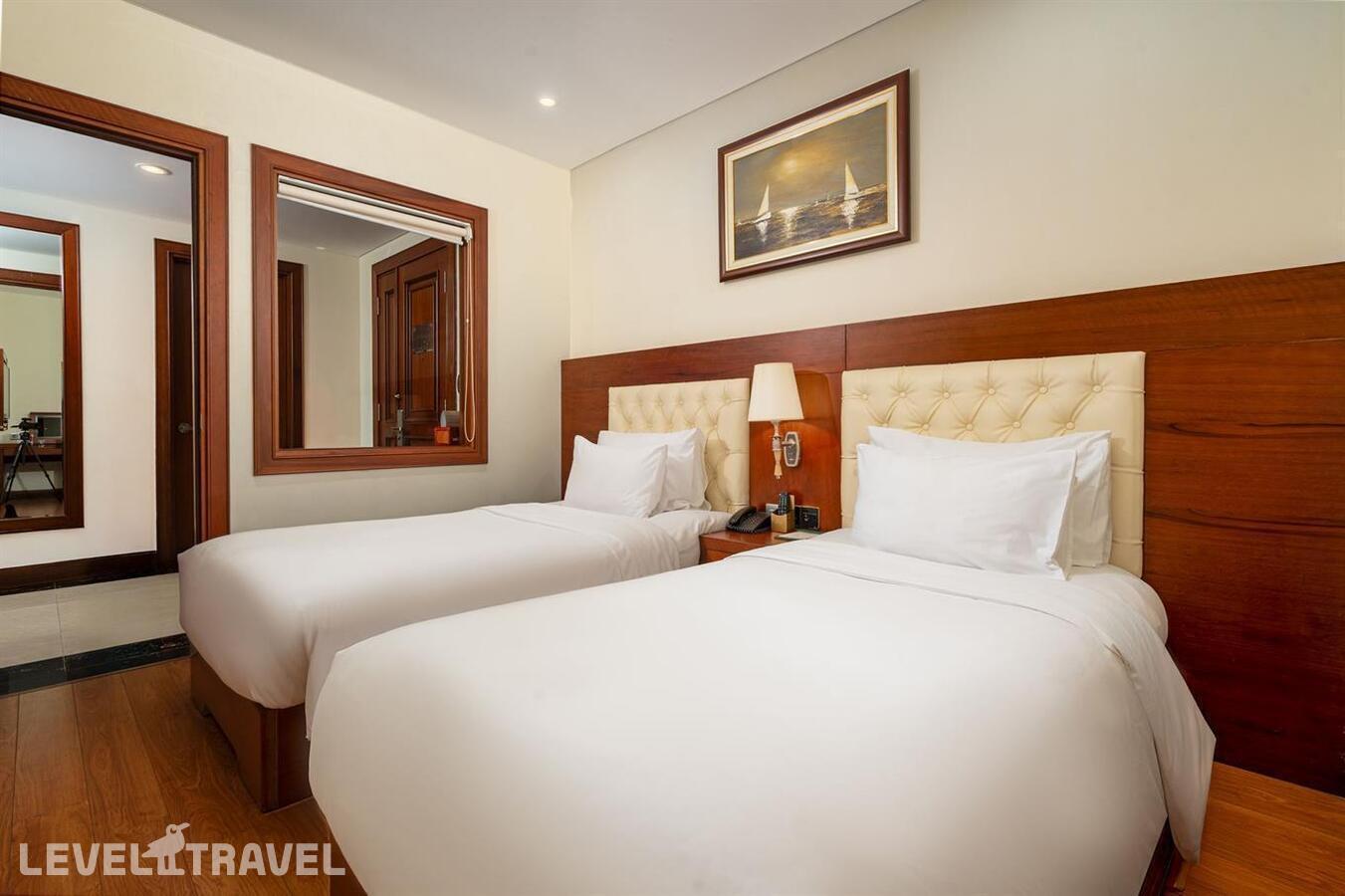 фотографии номера Семейный с частичным видом на море отеля Dlg Hotel Danang в Вьетнам(Дананг) - фото №2