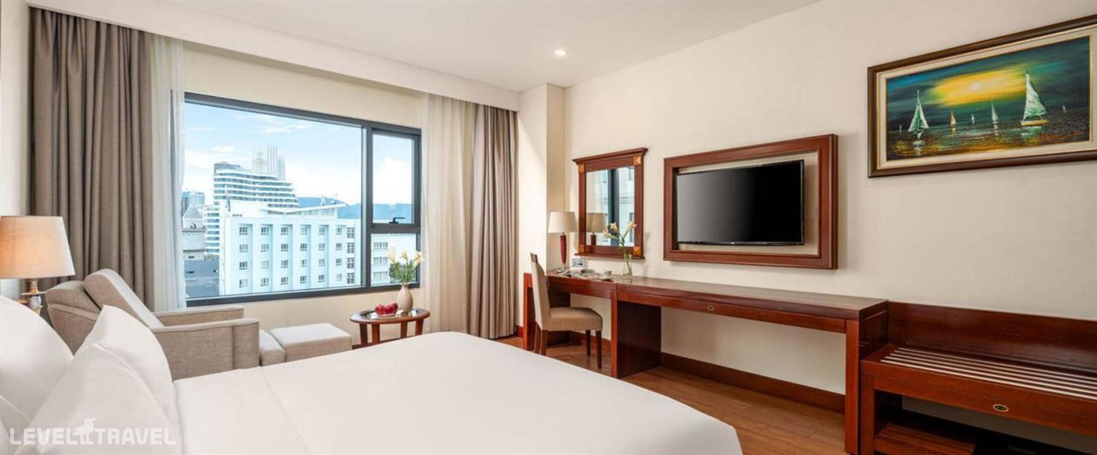 фотографии номера Делюкс с частичным видом на океан отеля Dlg Hotel Danang в Вьетнам(Дананг) - фото №2