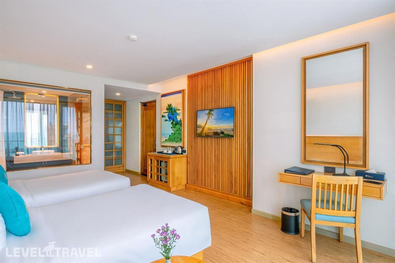 фотографии номера Делюкс с частичным видом на море отеля Sala Danang Beach в Вьетнам(Дананг) - фото №2