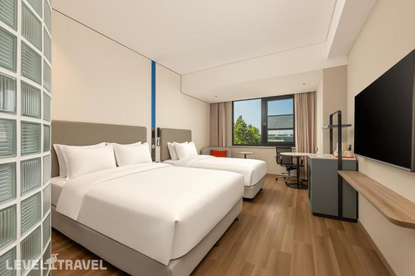 фотографии номера Трехместный номер с очистителем воздуха отеля Holiday Inn Express Beijing Airport Zone, An Ihg Hotel в Китай(Пекин) - фото №1