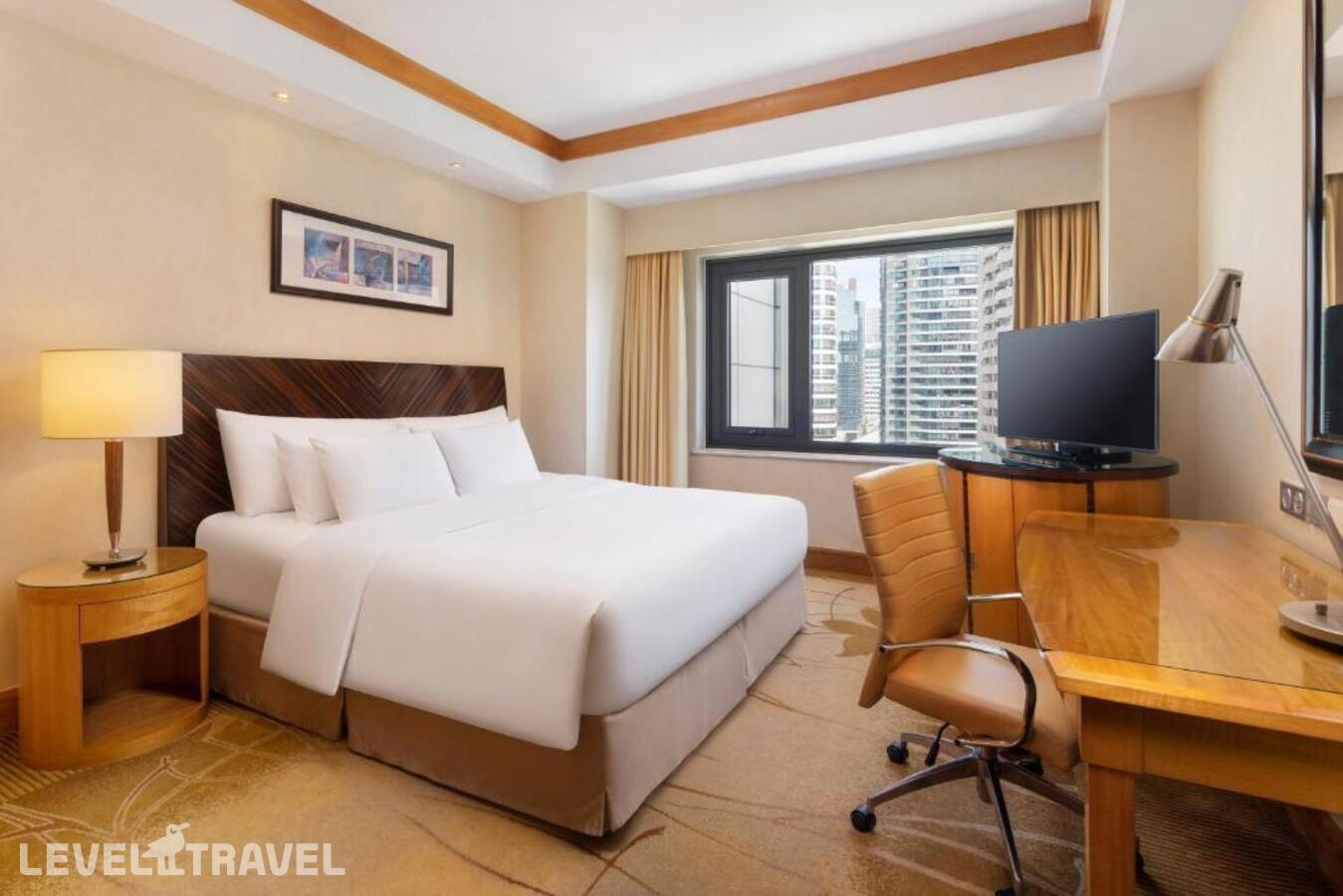 фотографии номера Стандартный с видом на сад отеля Radisson Collection Yangtze Shanghai в Китай(Шанхай) - фото №1