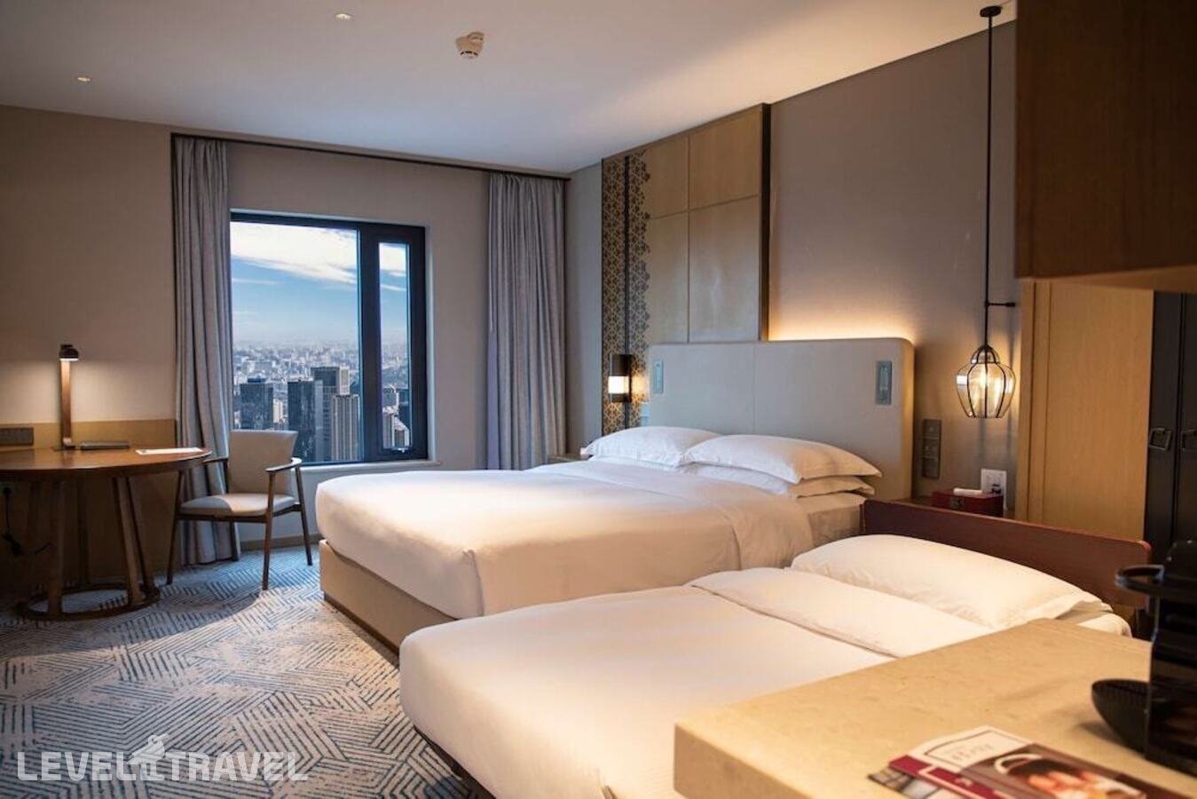 фотографии номера Семейный делюкс отеля Hilton Beijing в Китай(Пекин) - фото №1