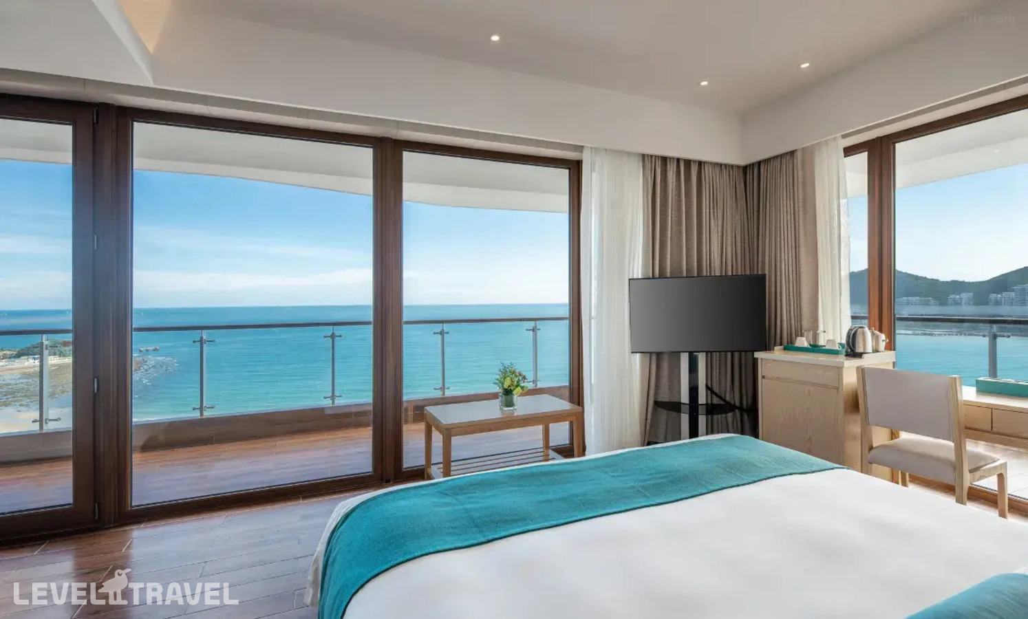 фотографии номера Номер с 270-градусным видом на океан отеля Dadonghai Hotel Sanya в Китай(Дадунхай Бэй) - фото №3