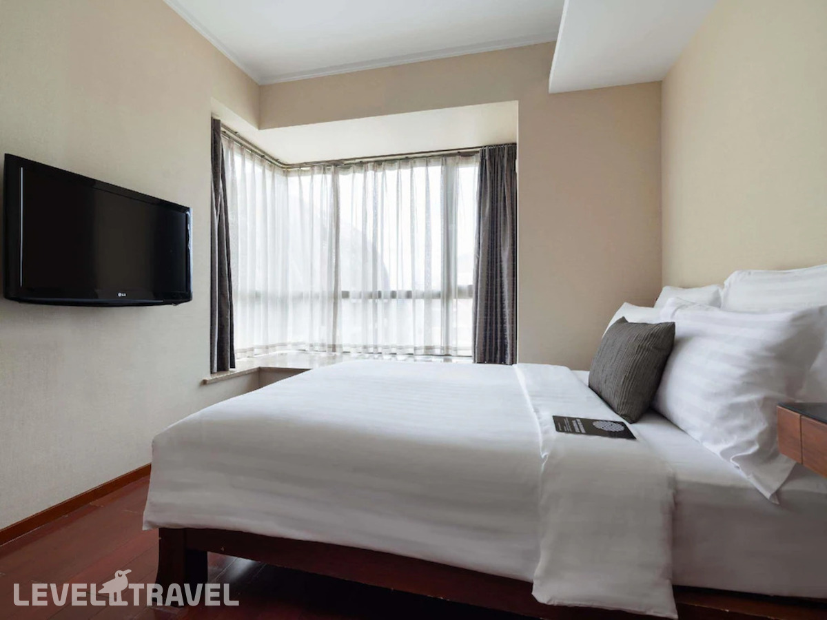 фотографии номера Апартаменты Суперлюкс с видом на океан (2 спальни) отеля Pullman Oceanview Sanya Bay Resort & Spa в Китай(Санья) - фото №3