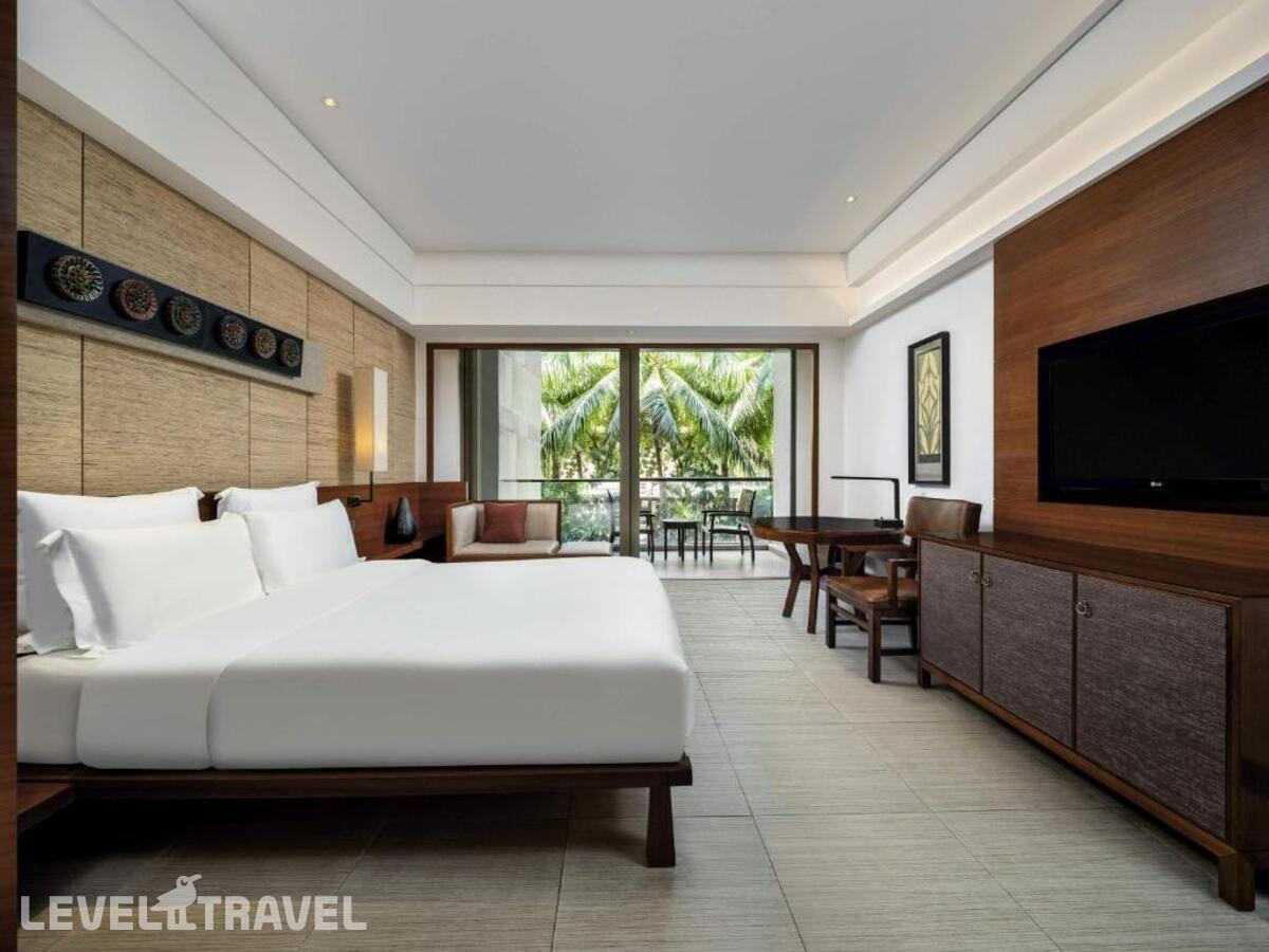 фотографии номера Улучшенный с видом на сад отеля Pullman Oceanview Sanya Bay Resort & Spa в Китай(Санья) - фото №1