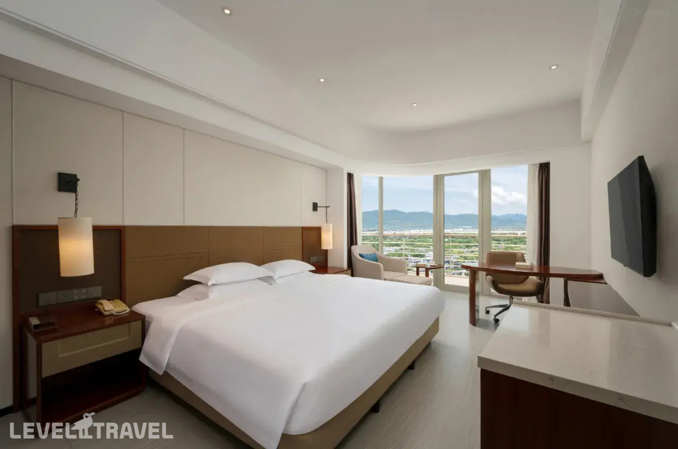 фотографии номера Делюкс с видом на сад отеля Grand Soluxe Hotel & Resort Sanya в Китай(Санья) - фото №1